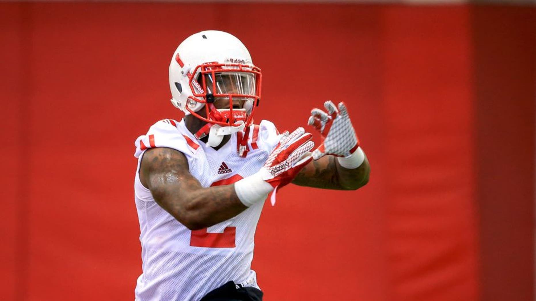 Nebraska running back Jordan Stevenson (2) makes a catch during NCAA college football practice in Lincoln, Neb., Thursday, Aug. 6, 2015. (AP Photo/Nati Harnik)