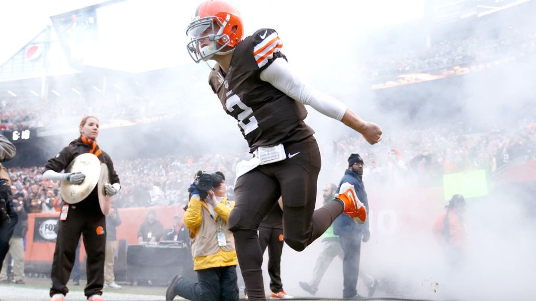 CLEVELAND, OH - DECEMBER 14: Johnny Manziel #2 of the Cleveland Browns runs onto the field during player introductions before the game against the Cincinnati Bengals at FirstEnergy Stadium on December 14, 2014 in Cleveland, Ohio. The Bengals defeated the Browns 30-0. (Photo by Joe Robbins/Getty Images)