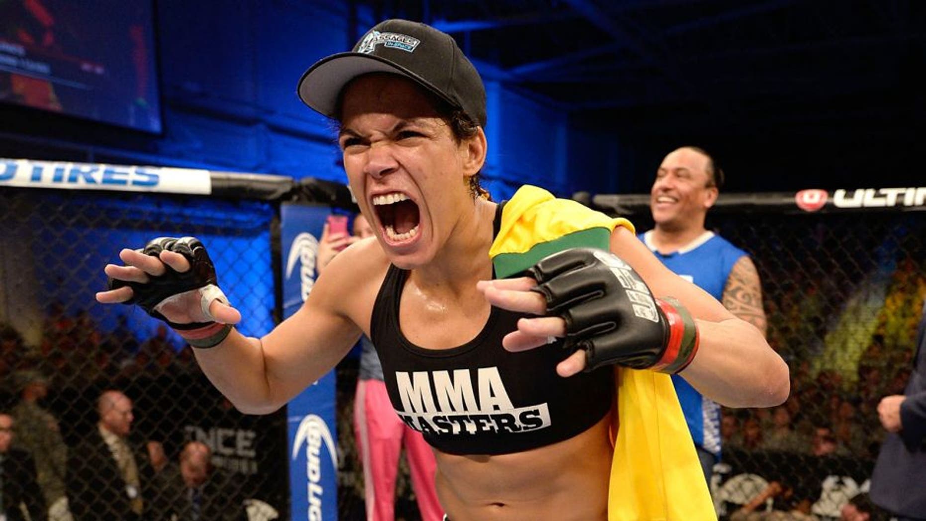 FORT CAMPBELL, KENTUCKY - NOVEMBER 6: Amanda Nunes reacts to her victory over Germaine de Randamie in their UFC women's bantamweight bout on November 6, 2013 in Fort Campbell, Kentucky. (Photo by Jeff Bottari/Zuffa LLC/Zuffa LLC via Getty Images)