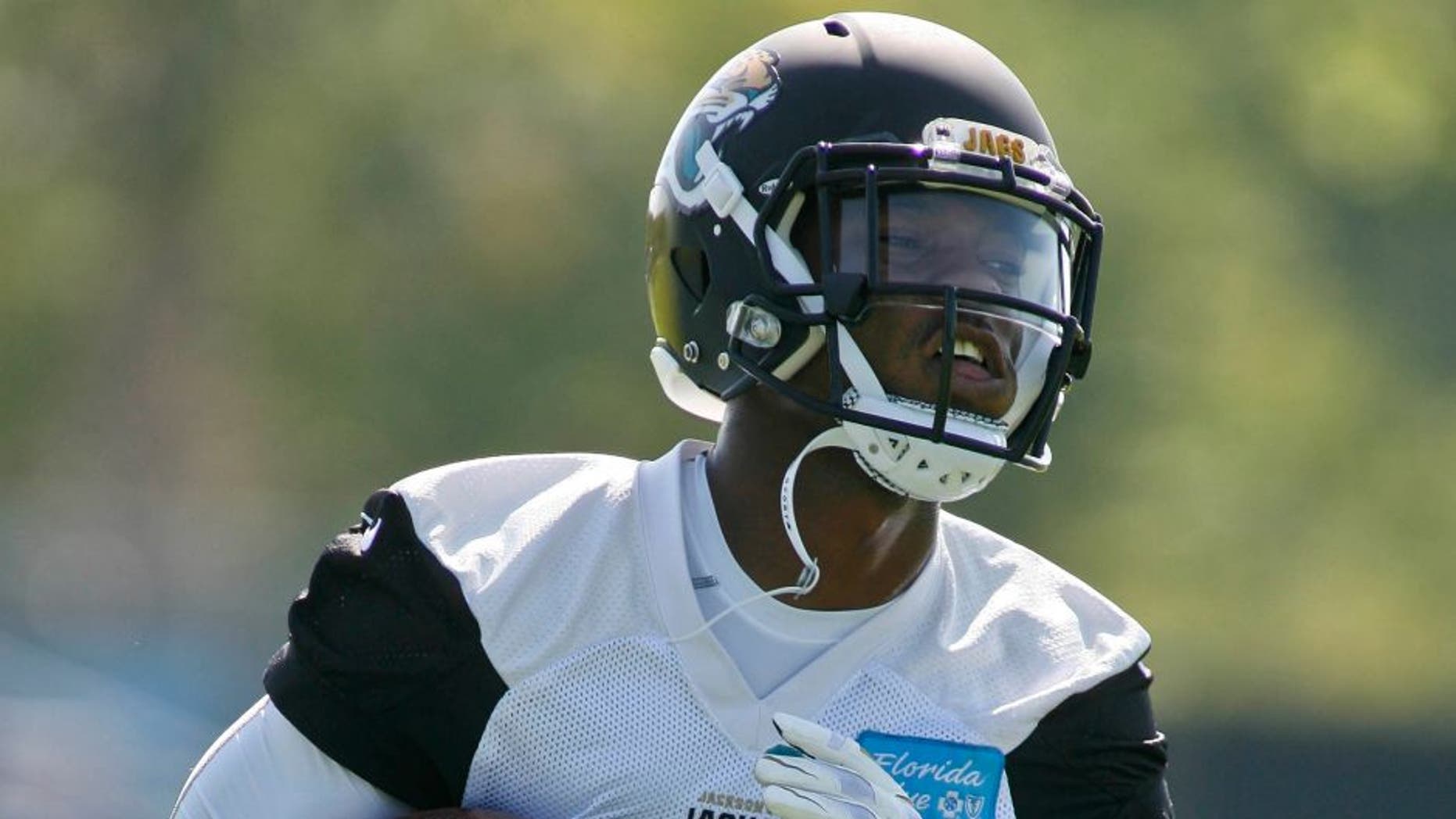 Jun 16, 2015; Jacksonville, FL, USA; Jacksonville Jaguars cornerback Nick Marshall (41) returns a punt during minicamp at the Florida Blue Health and Wellness Practice Fields. Mandatory Credit: Phil Sears-USA TODAY Sports