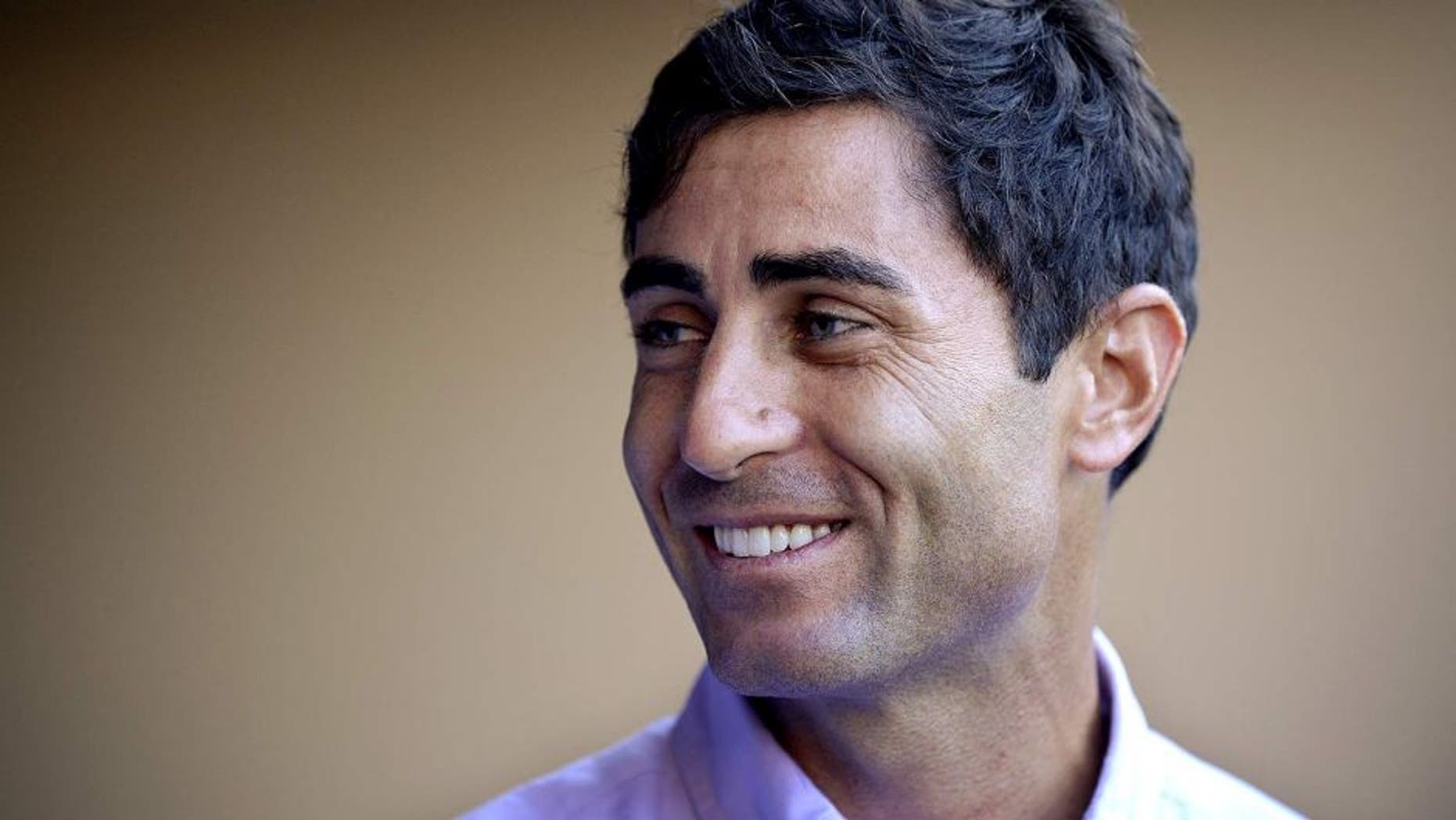 SAN DIEGO, CA - AUGUST 26: AJ Preller of the San Diego Padres visits the dugout prior to the game against the Milwaukee Brewers at Petco Park on August 26, 2014 in San Diego, California. (Photo by Andy Hayt/San Diego Padres/Getty Images) *** Local Caption *** AJ Preller