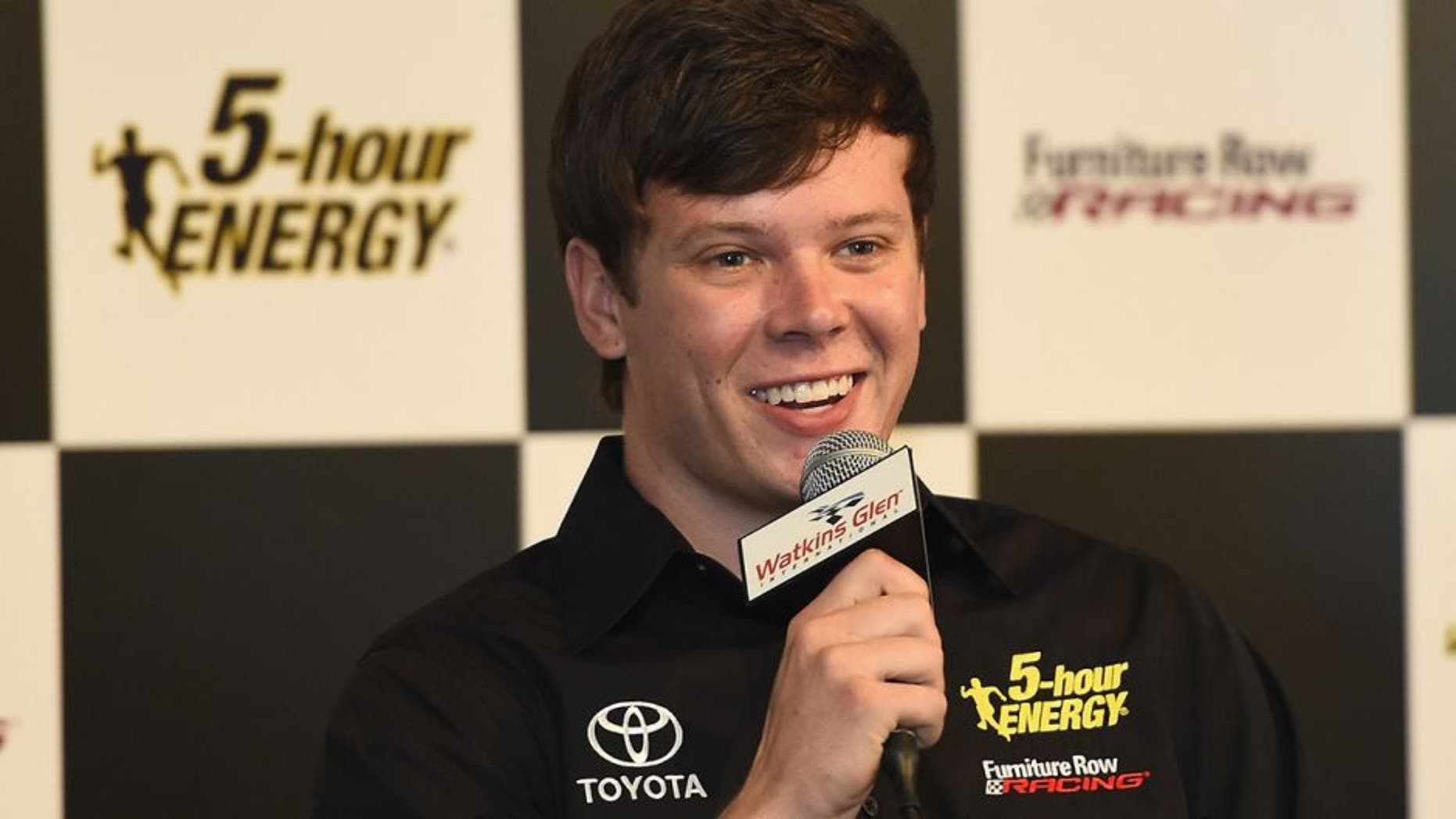 WATKINS GLEN, NY - AUGUST 07: Erik Jones speaks to the media after announcing he will drive the #77 5 -hour Energy Toyota for Furniture Row Racing in 2017 prior to the NASCAR Sprint Cup Series Cheez-It 355 at Watkins Glen International on August 7, 2016 in Watkins Glen, New York. (Photo by Josh Hedges/Getty Images)