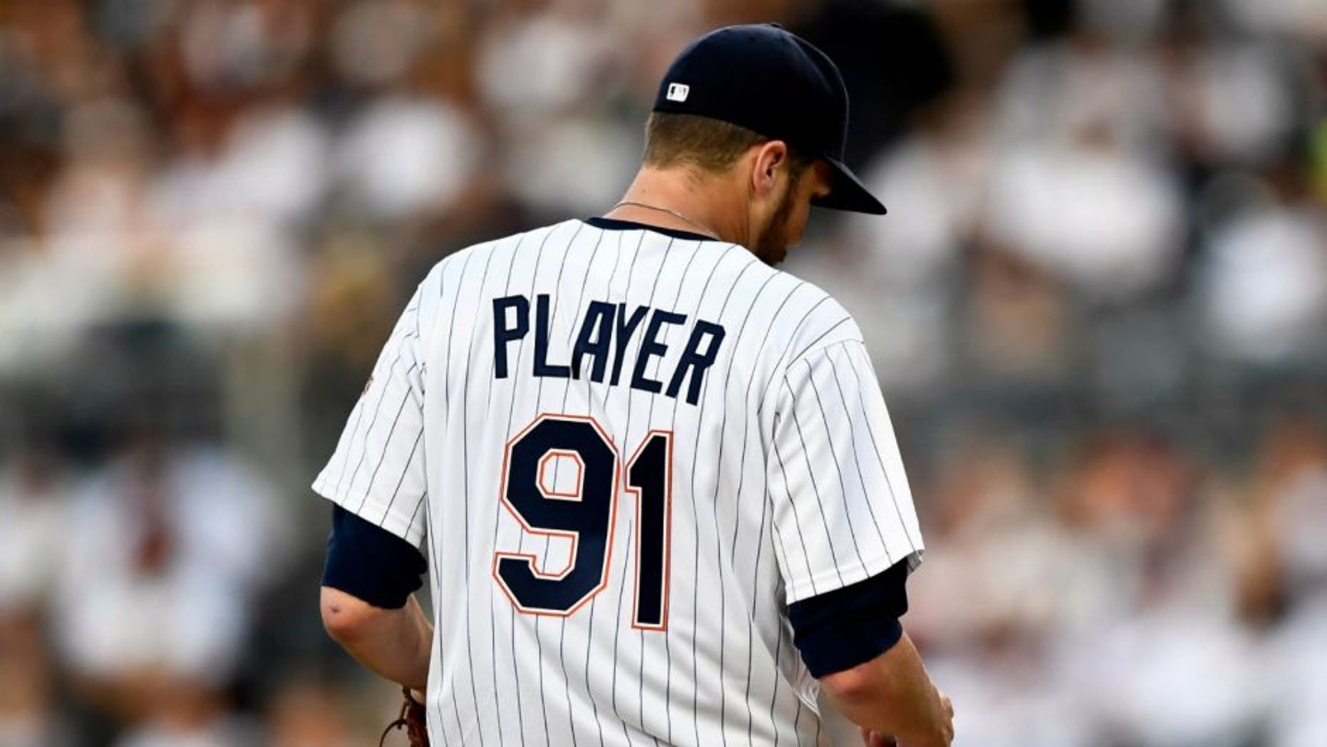 San Diego Padres starting pitcher Paul Clemens stands on the mound during a crucial situation against the Philadelphia Phillies in the fourth inning of a baseball game Saturday, Aug. 6, 2016, in San Diego. Clemens was told to change his jersey by umpire Mike Everett when pine tar was found on the jersey. (AP Photo/San Diego Padres)
