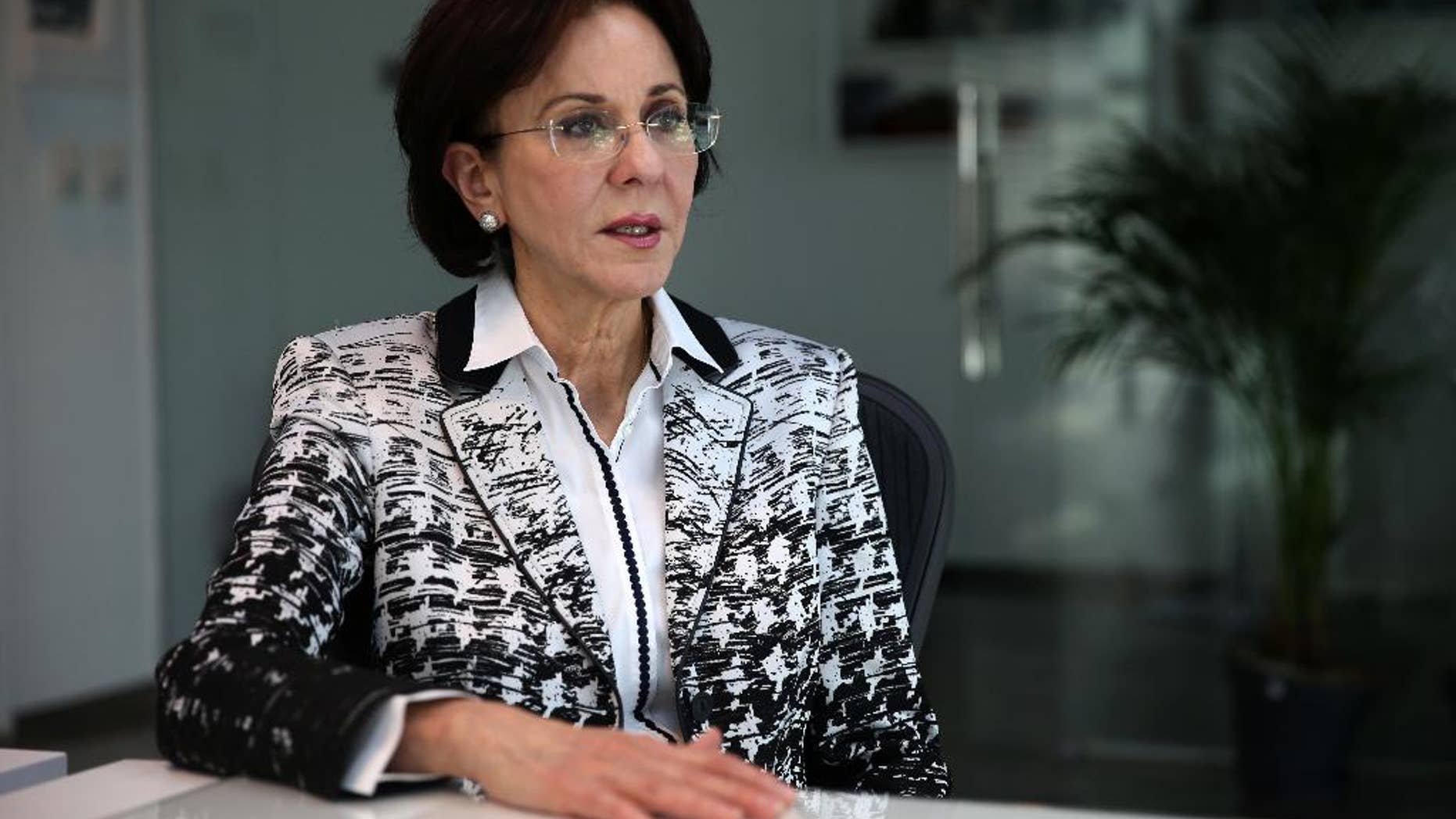 In this Wednesday, April 19, 2017 photo, former veteran U.N. official Rima Khalaf speaks in Amman, Jordan about her decision to resign as head of a U.N. regional agency, ESCWA, after refusing to withdraw an agency report that labeled Israel an apartheid state. Khalaf says the issue deserves serious study, while official Israel and its supporters label the apartheid charge as anti-Semitism and an attempt to single out Israel. (AP Photo/Sam McNeil) (AP Photo/Sam McNeil)