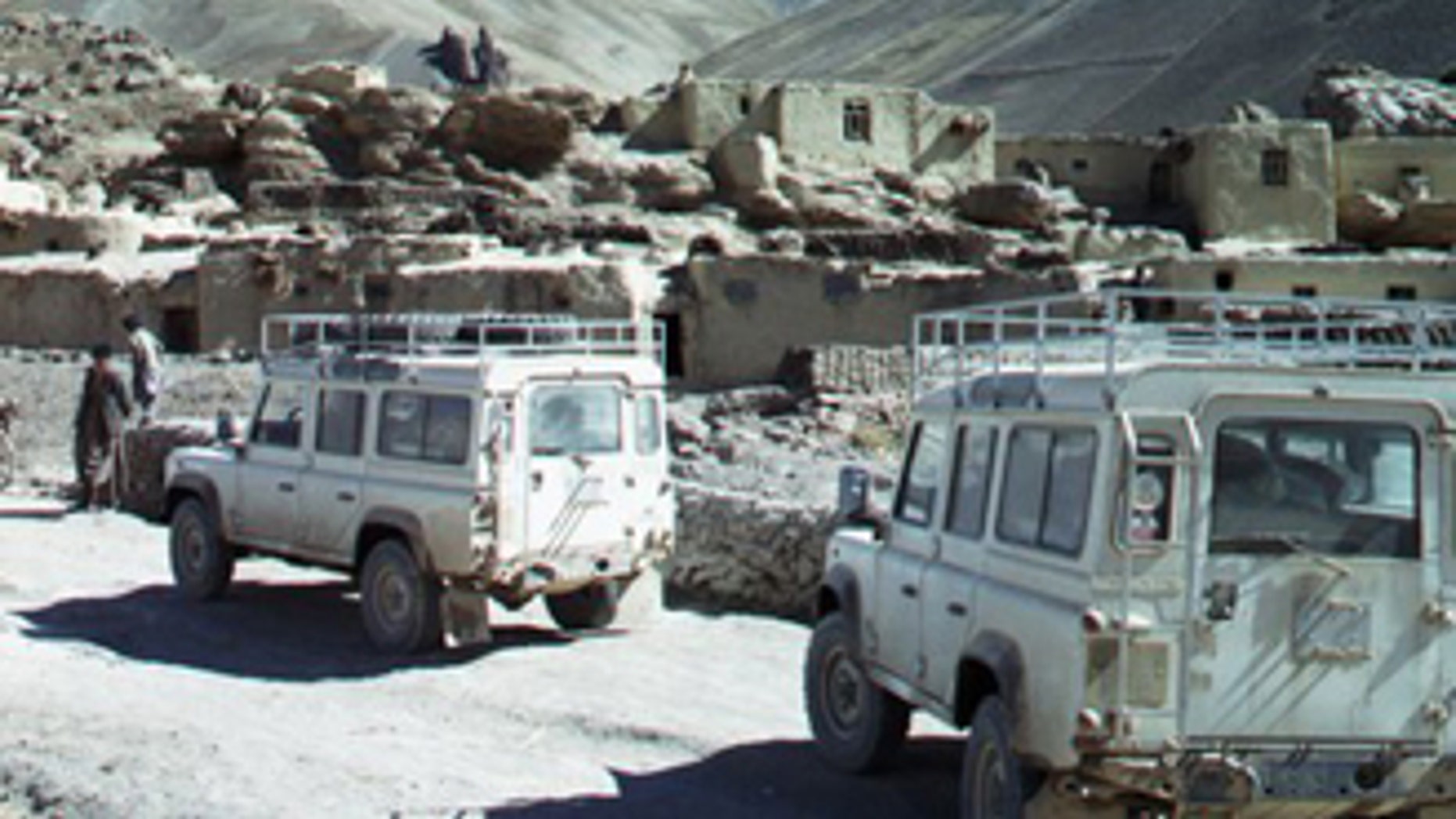 In this undated photo released by David L. Evans, two Land Rovers with International Assistance Mission personnel aboard, navigate down a road in an unnamed region of Afghanistan. Members of a medical team were shot and killed by militants as they were returning from providing eye treatment and other health care in remote villages in northern Afghanistan, a spokesman for the team said Saturday, Aug. 7, 2010. Dirk Frans, director of the International Assistance Mission, said six Americans, one German, one Briton and two Afghans also were part of the medical team that made the three-week trip to Nuristan province. They drove to the province, left their vehicles and hiked for hours with pack horses over mountainous terrain to reach the Parun valley in the province's northwest. (AP Photo/Provided by David L. Evans) NO SALES