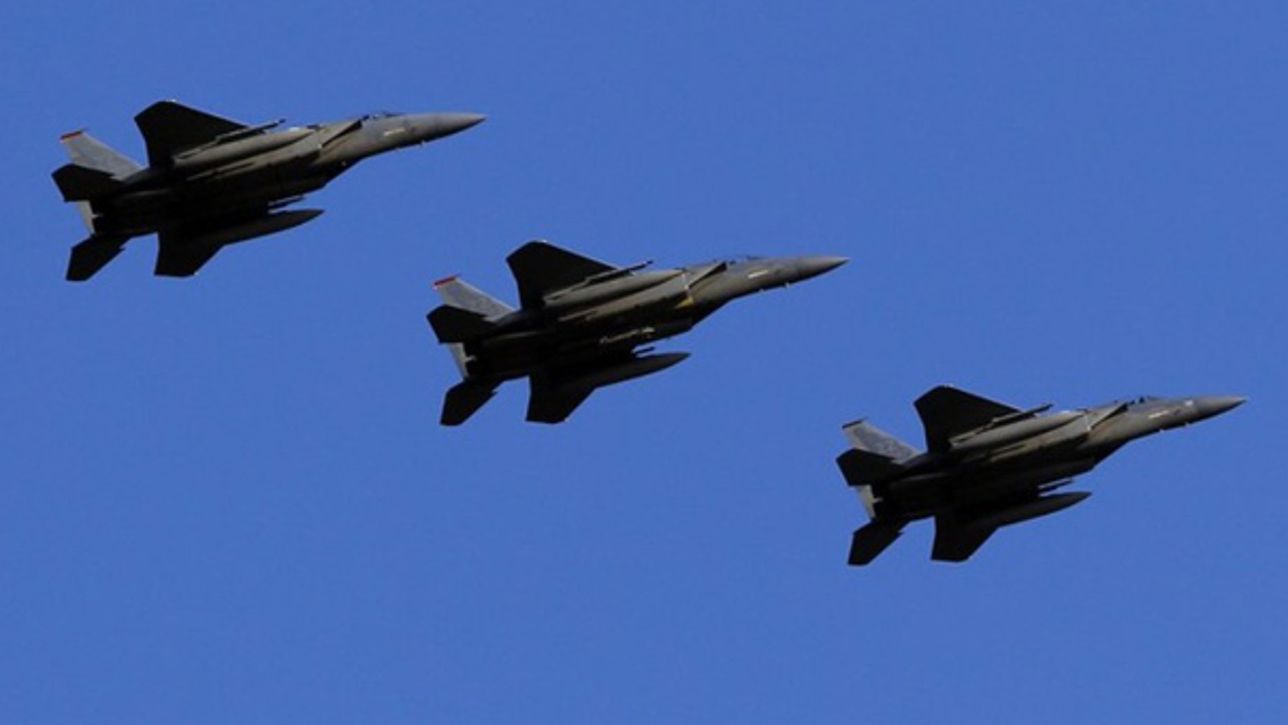 Feb. 25: U.S. Air Force F-15 Eagle fighter jets fly over Kadena Air Base in Japan.
