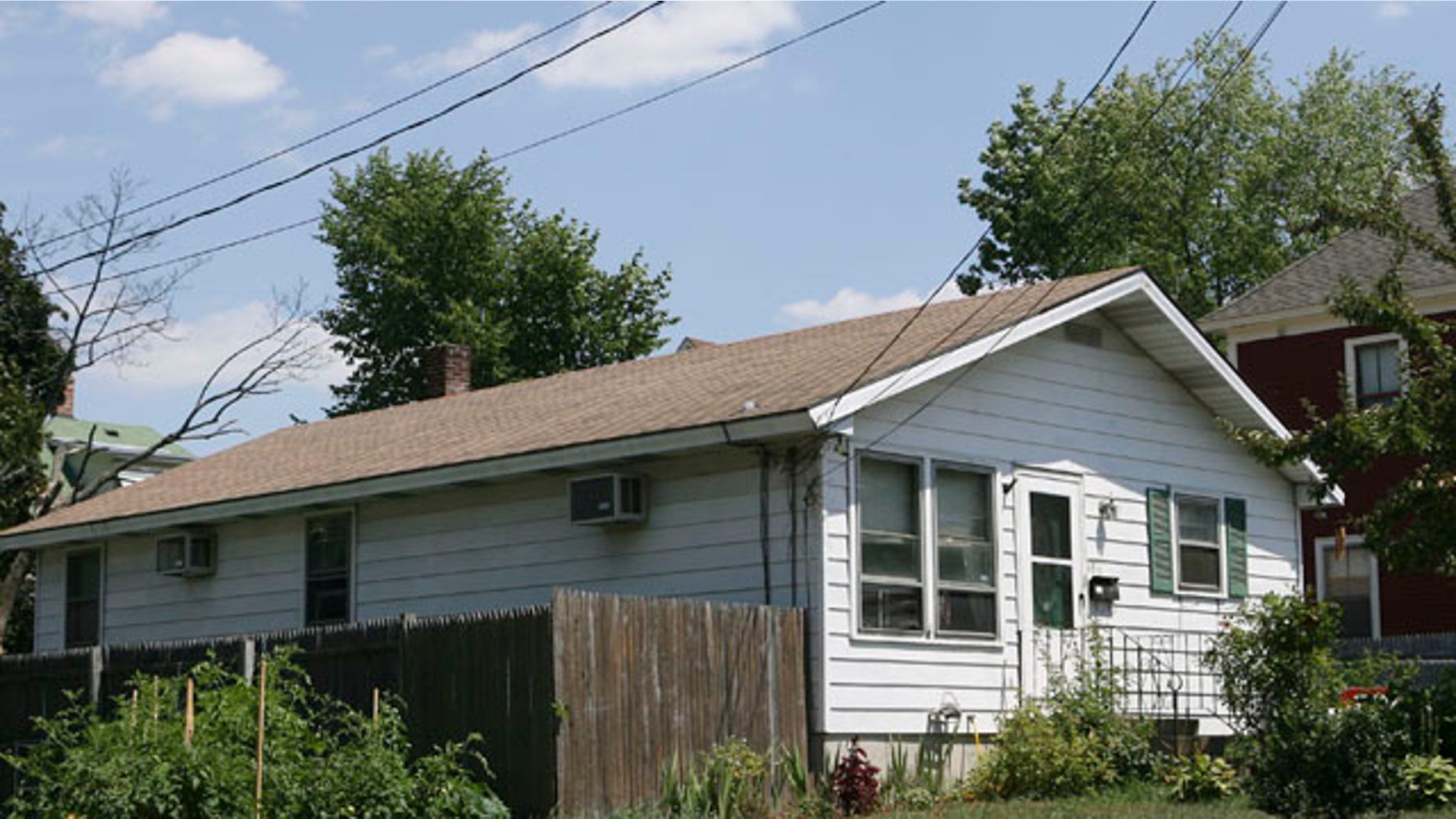 July 28: The home of Beatrice Munyenyezi, 40, is seen in Manchester, N.H.