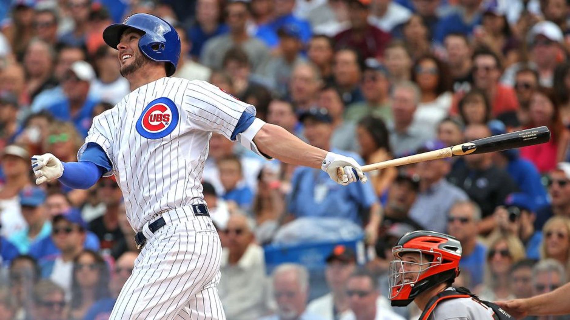 CHICAGO, IL - AUGUST 08: Kris Bryant #17 of the Chicago Cubs hits a two-run home run in the 3rd inning against the San Francisco Giants at Wrigley Field on August 8, 2015 in Chicago, Illinois. (Photo by Jonathan Daniel/Getty Images)