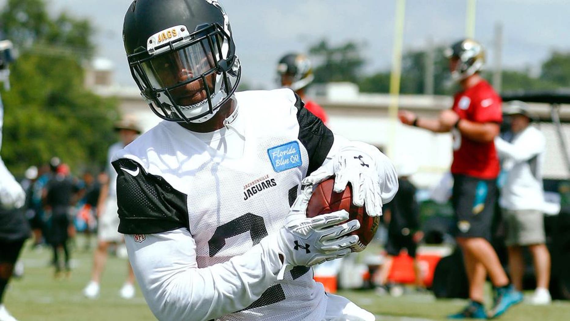 Jul 31, 2015; Jacksonville, FL, USA; Jacksonville Jaguars running back T.J. Yeldon (24) runs the ball during training camp workouts at Florida Blue Health & Wellness Practice Field. Mandatory Credit: Reinhold Matay-USA TODAY Sports