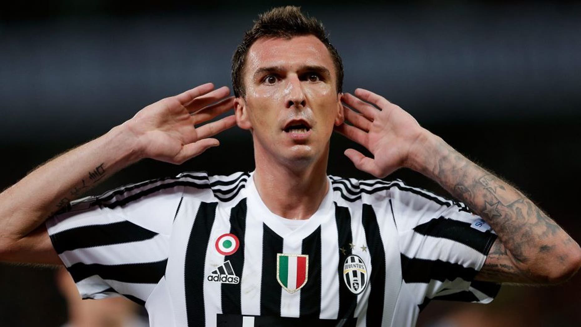 SHANGHAI, CHINA - AUGUST 08: Mario Mandzukic of Juventus FC in celebrates a goal during the Italian Super Cup final football match between Juventus and Lazio at Shanghai Stadium on August 8, 2015 in Shanghai, China. (Photo by Lintao Zhang/Getty Images)