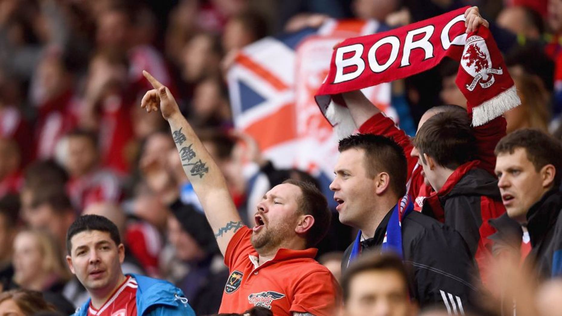 MIDDLESBROUGH, ENGLAND - MAY 15: Middlesbrough fans show their support during the Sky Bet Championship Playoff semi final second leg match between Middlesbrough and Brentford at the Riverside Stadium on May 15, 2015 in Middlesbrough, England. (Photo by Laurence Griffiths/Getty Images)