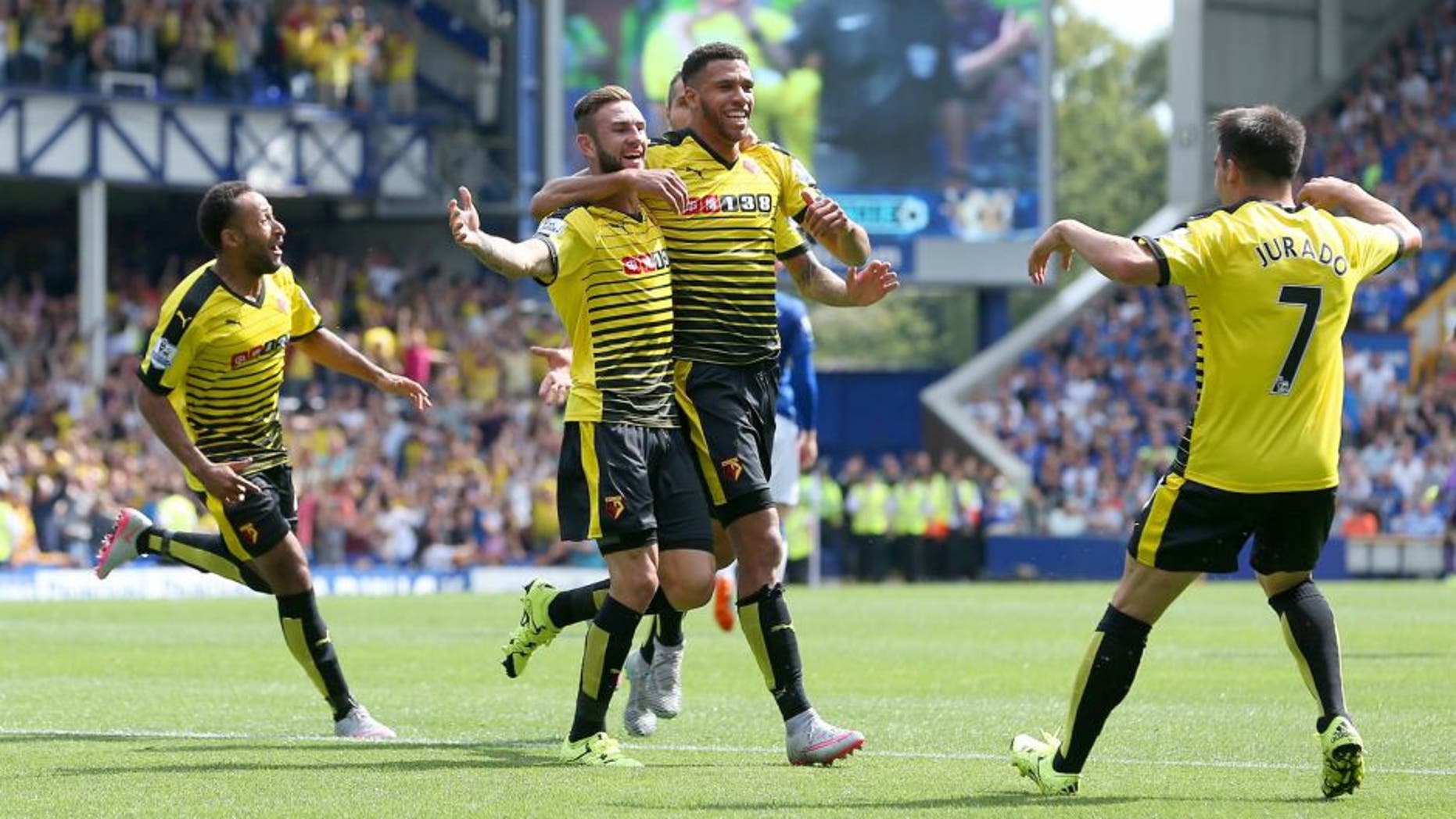 LIVERPOOL, ENGLAND - AUGUST 08: Miguel Layun of Watford celebrates scoring his team's first goal with his team mate Etienne Capoue during the Barclays Premier League match between Everton and Watford at Goodison Park on August 8, 2015 in Liverpool, England. (Photo by Jan Kruger/Getty Images)