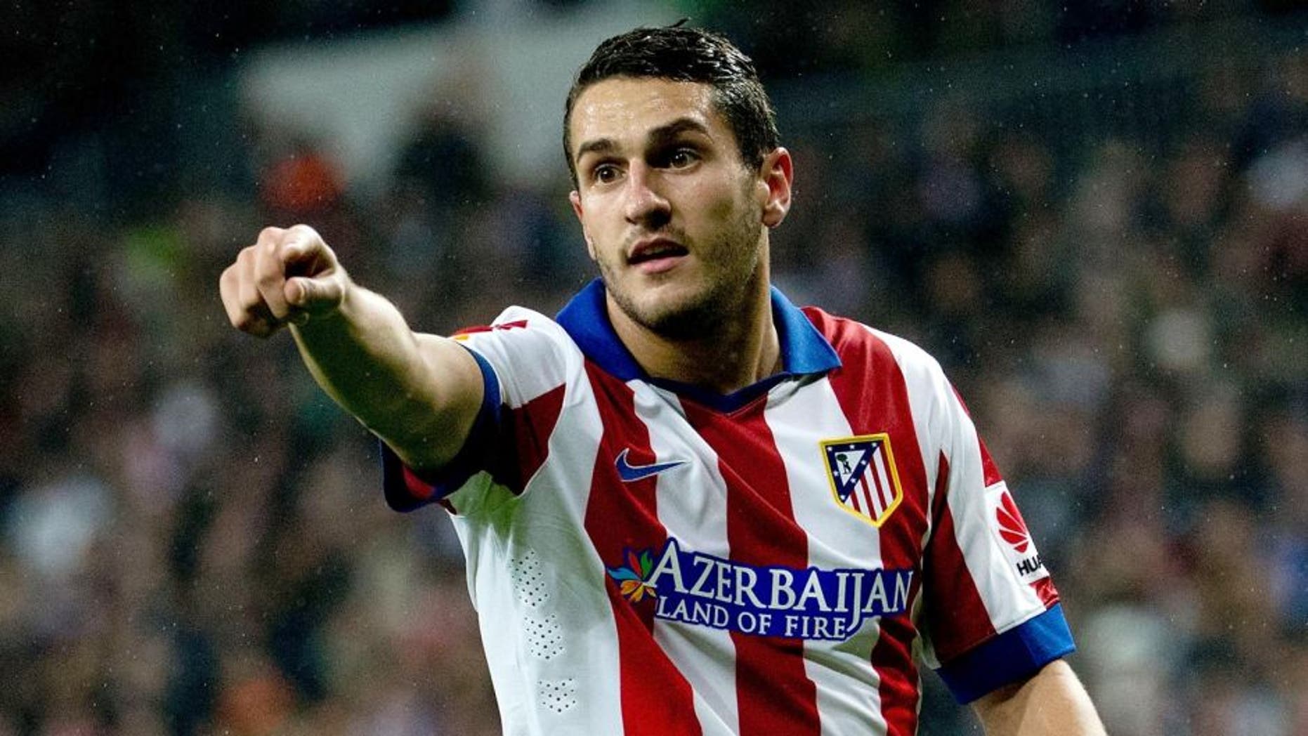 MADRID, SPAIN - JANUARY 15: Koke of Atletico de Madrid gives instructions to thier teammates during the Copa del Rey Round of 16 second leg match between Real Madrid CF and Club Atletico de Madrid at Estadio Santiago Bernabeu on January 15, 2015 in Madrid, Spain. (Photo by Gonzalo Arroyo Moreno/Getty Images)