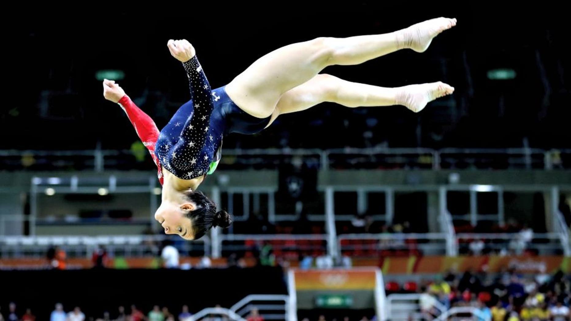 RIO DE JANEIRO, BRAZIL - AUGUST 07: Alexandra Raisman of the United States competes on the balance beam during Women's qualification for Artistic Gymnastics on Day 2 of the Rio 2016 Olympic Games at the Rio Olympic Arena on August 7, 2016 in Rio de Janeiro, Brazil (Photo by Ezra Shaw/Getty Images)