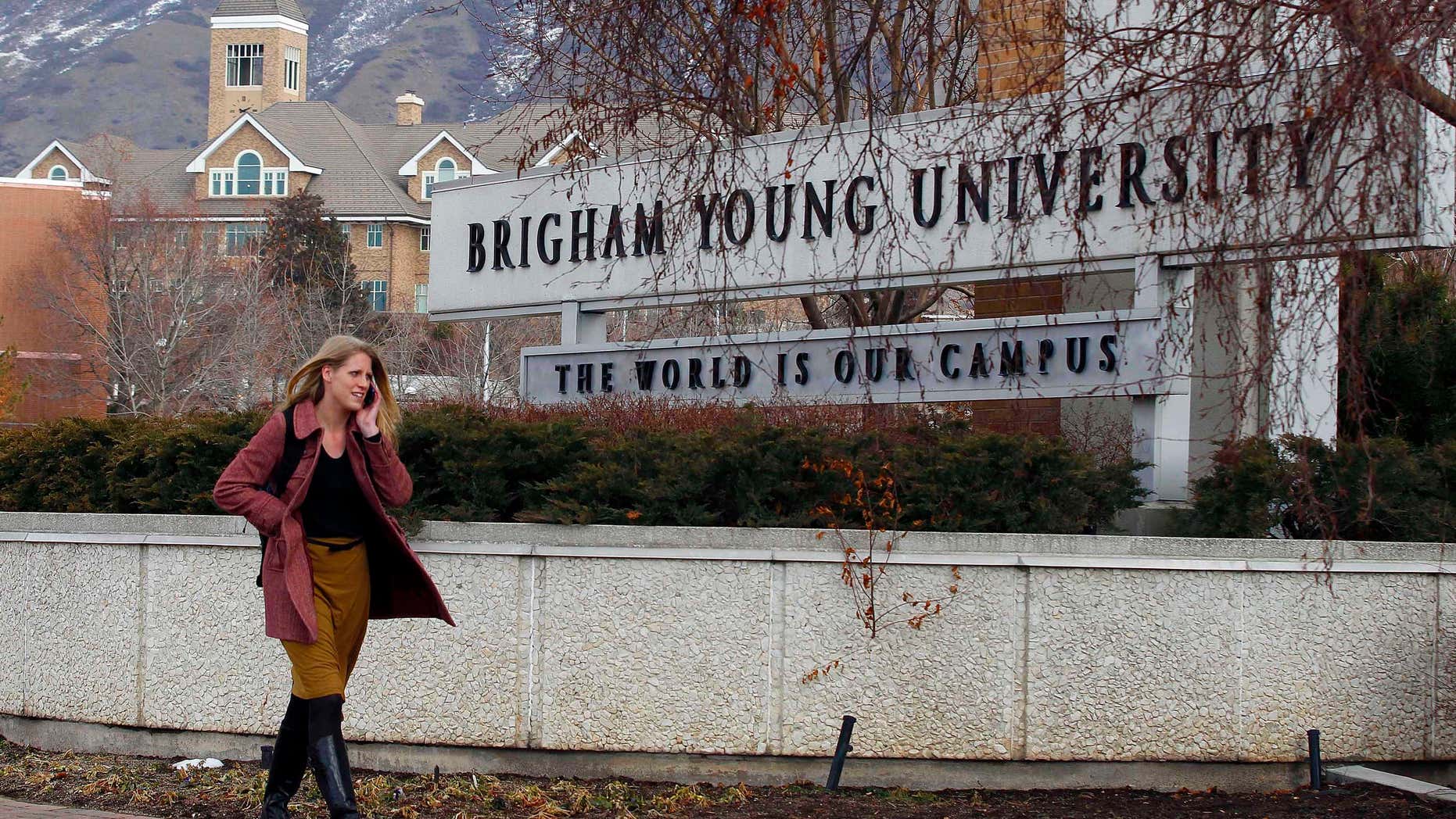 Feb. 17, 2012: A student walks past the entrance of Brigham Young University in Provo.