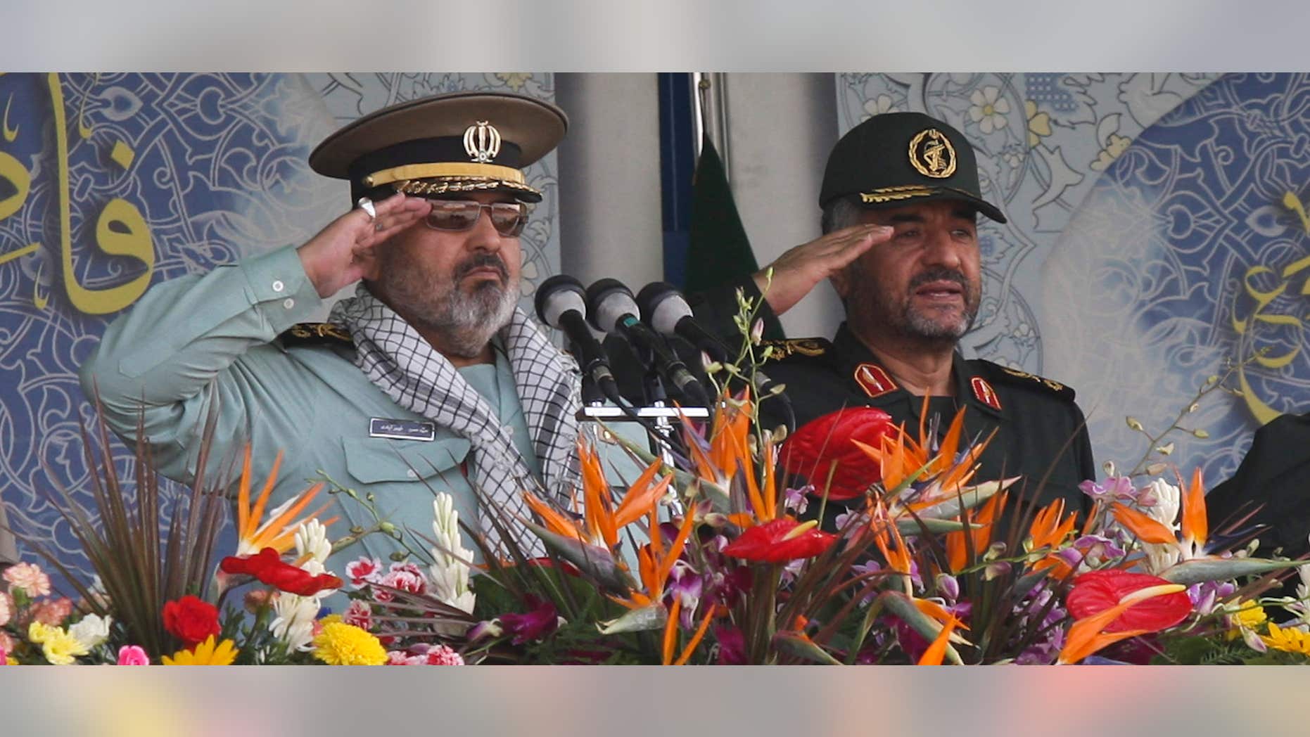 Sept. 22, 2011: Iran's Armed Forces Chief of Staff Hassan Firouzabadi (L) and Revolutionary guards commander Mohammad Ali Jafari salute during a parade to commemorate the anniversary of the Iran-Iraq war.