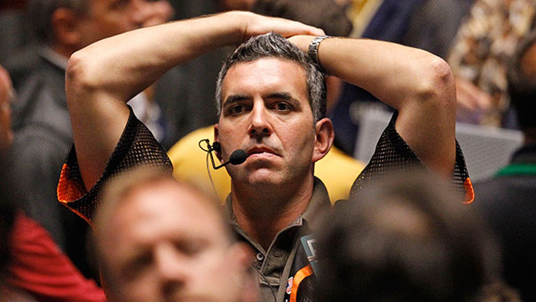 Aug. 8: Trader Patrick Garveyreacts after the close of trading in the S&P 500 Futures pit, on the floor of The CME Group in Chicago.
