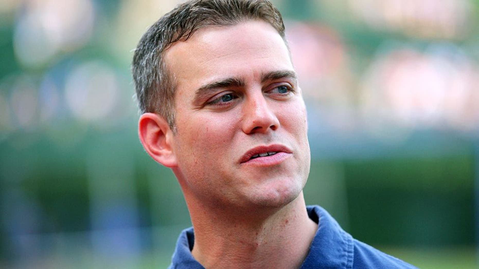 Jun 16, 2012; Chicago, IL, USA; Chicago Cubs president of baseball operations Theo Epstein prior to a game against the Boston Red Sox at Wrigley Field. Mandatory Credit: Dennis Wierzbicki-USA TODAY Sports