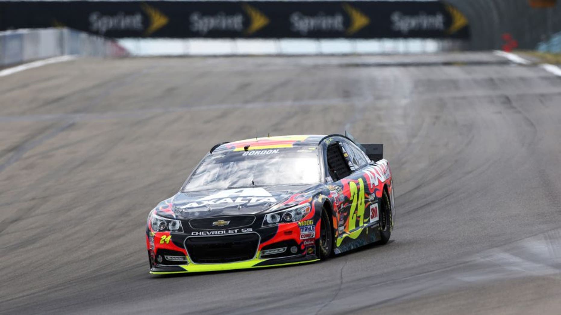 WATKINS GLEN, NY - AUGUST 08: Jeff Gordon, driver of the #24 Axalta Chevrolet, races during qualifying for the NASCAR Sprint Cup Series Cheez-It 355 at Watkins Glen International on August 8, 2015 in Watkins Glen, New York. (Photo by Todd Warshaw/Getty Images)