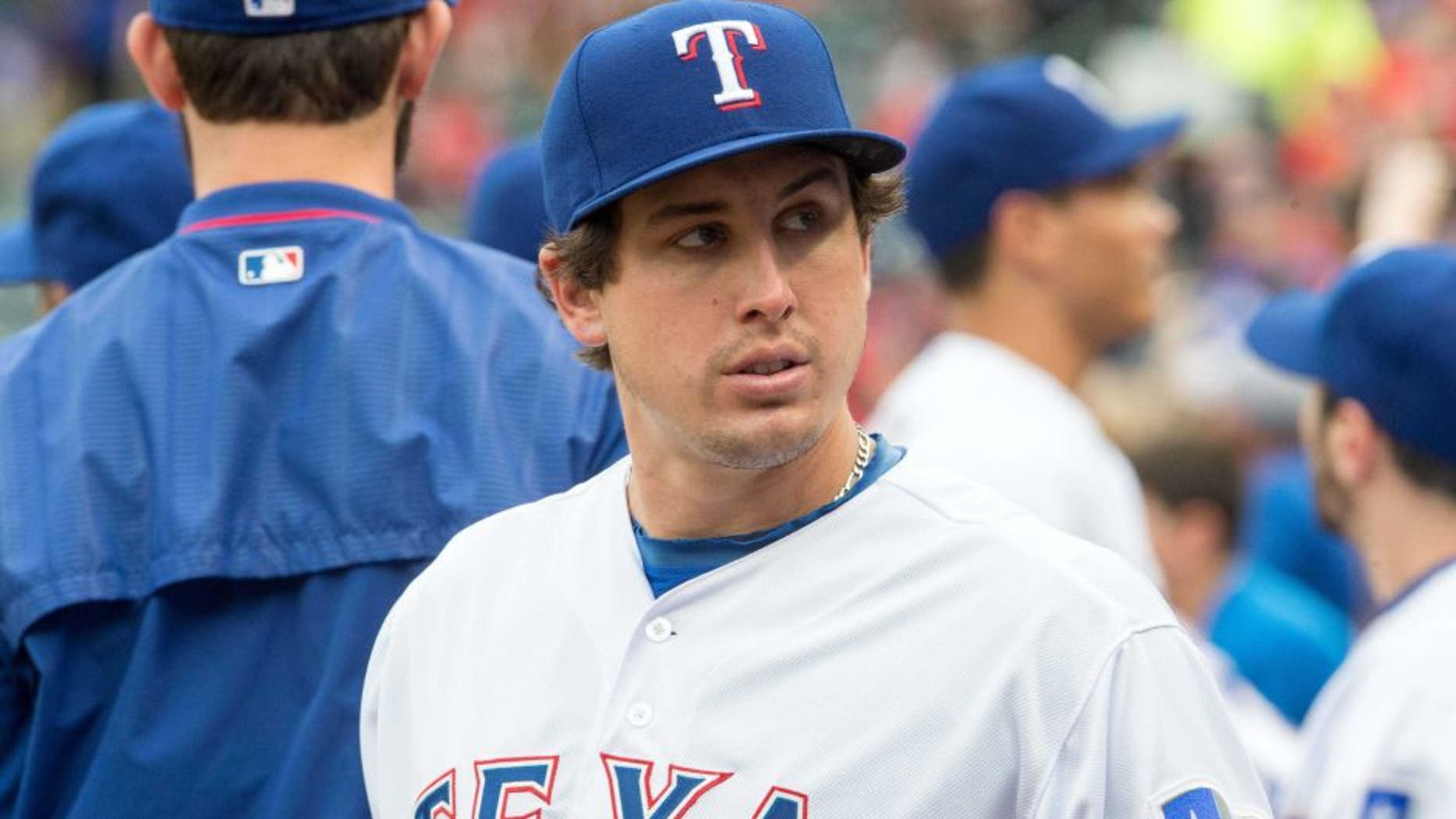 May 15, 2015; Arlington, TX, USA; Texas Rangers starting pitcher Derek Holland (45) before the game against the Cleveland Indians at Globe Life Park in Arlington. Mandatory Credit: Jerome Miron-USA TODAY Sports