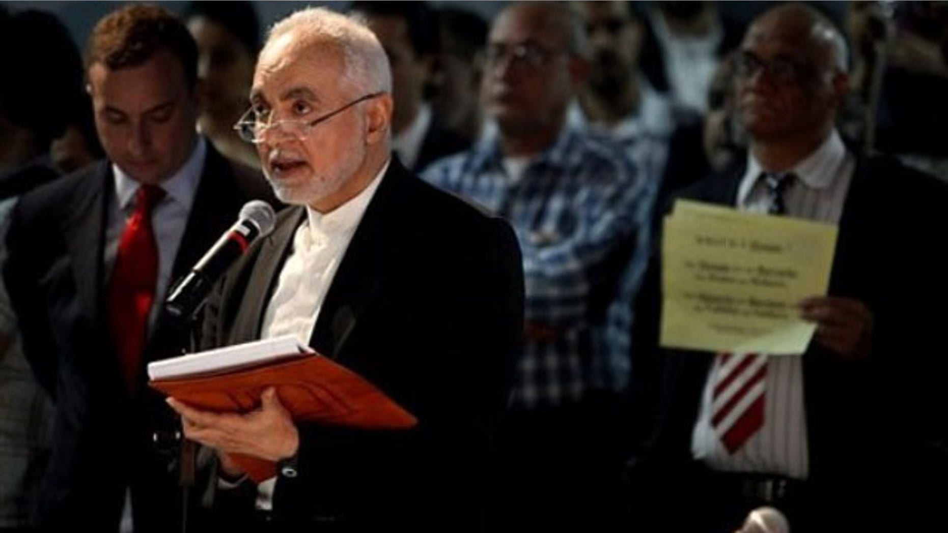 Imam Feisal Abdul Rauf, executive director of the Cordoba Initiative, addresses a gathering as groups planning a proposed mosque and cultural center near Ground Zero in Lower Manhattan to be named Cordoba House showed and spoke about their plans for the center at a community board meeting in New York Tuesday, May 25, 2010. Community members both for and against the plan spoke during the meeting (AP).