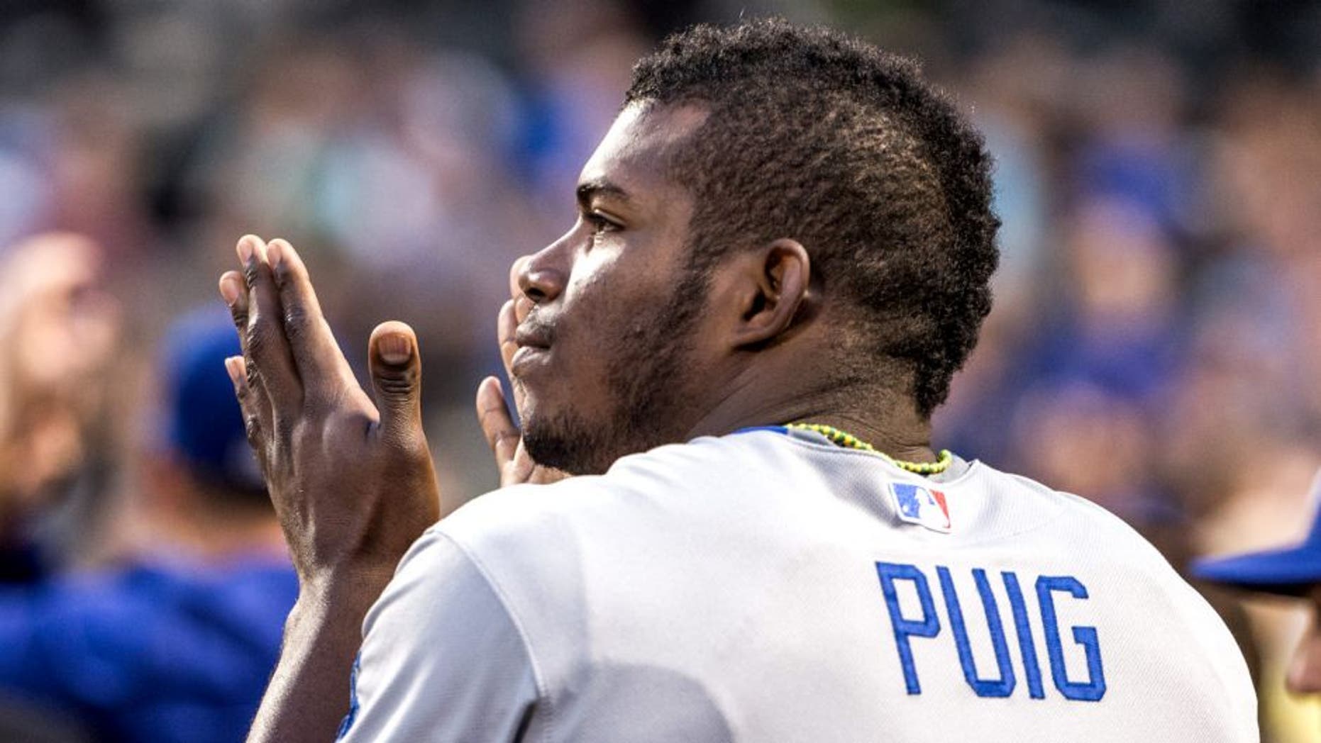 NEW YORK - JULY 25: Yasiel Puig #66 of the Los Angeles Dodgers looks on during the game against the New York Mets at Citi Field on July 25, 2015 in the Queens borough of New York City. (Photo by Rob Tringali/SportsChrome/Getty Images)