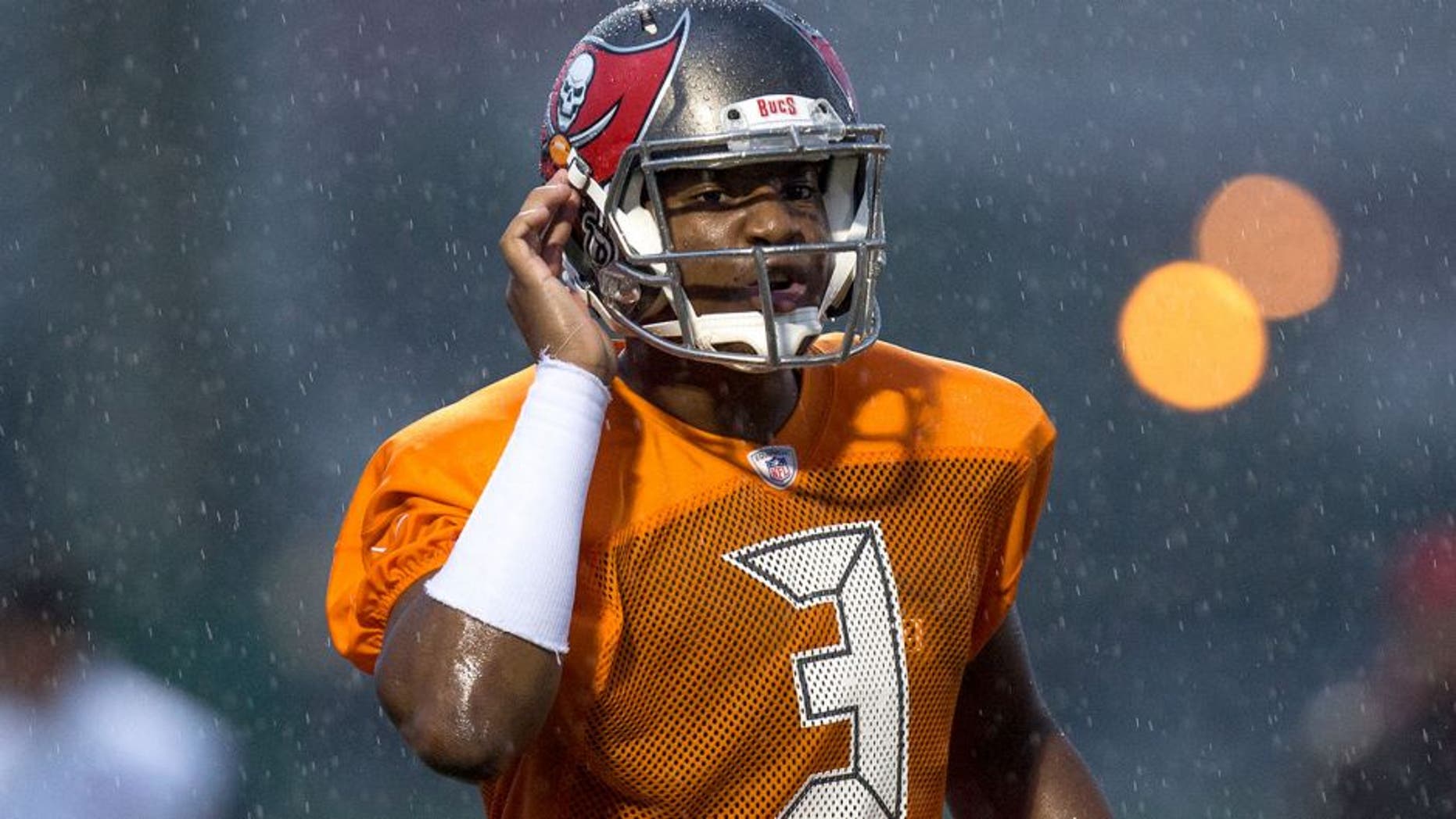TAMPA, FL - AUGUST 1: Quarterback Jameis Winston #3 of the Tampa Bay Buccaneers works out during the first day of Training Camp at the University of South Florida on August 1, 2015 in Tampa, Florida. (Photo by Don Juan Moore/Getty Images)