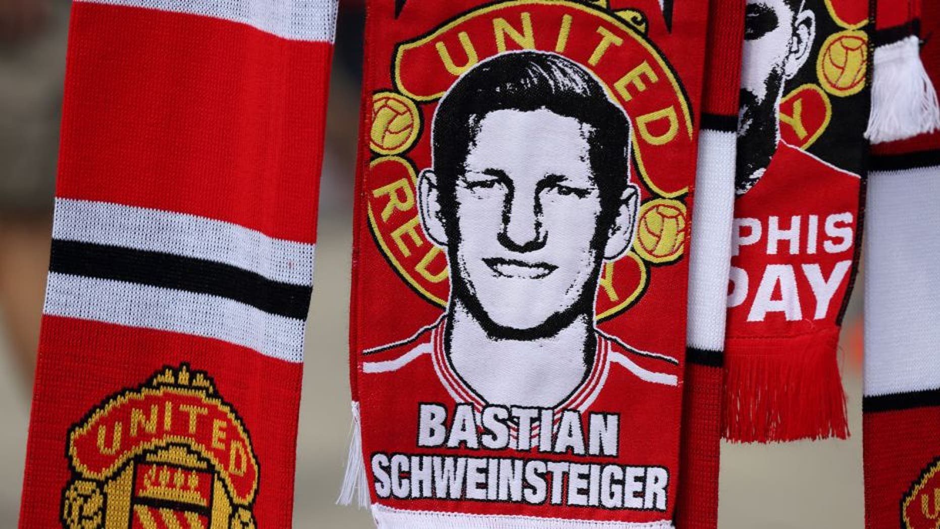 MANCHESTER, ENGLAND - AUGUST 08: A scarf of Bastian Schweinsteiger of Manchester United before the Barclays Premier League match between Manchester United and Tottenham Hotspur at Old Trafford on August 08, 2015 in Manchester, England. (Photo by Matthew Ashton - AMA/Getty Images)