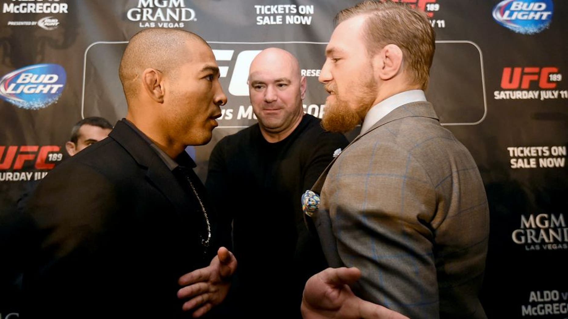 LONDON, ENGLAND - MARCH 30: UFC Featherweight Champion Jose Aldo (L) and UFC Featherweight Contender Conor McGregor (R) face off during the UFC 189 World Championship Press Tour on March 30, 2015 in London, England. (Photo by Tom Dulat/Zuffa LLC via Getty Images)