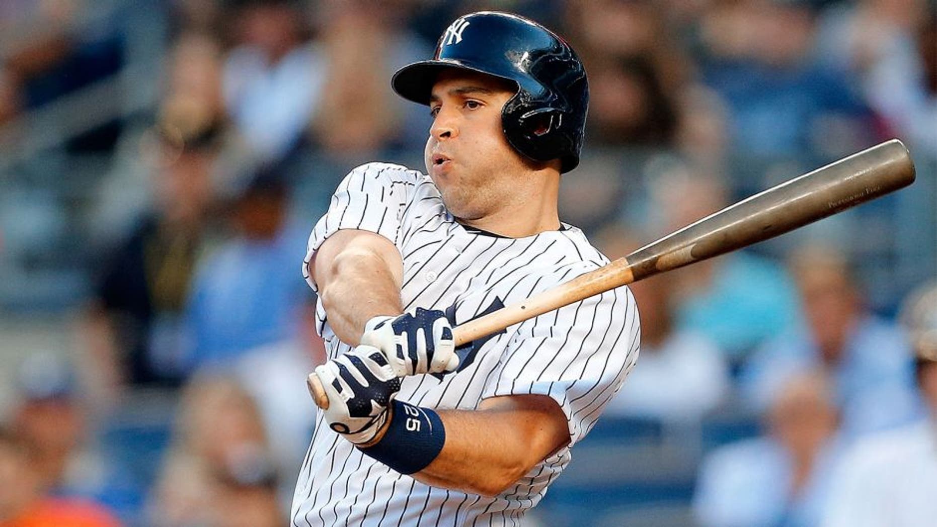 NEW YORK, NY - AUGUST 04: Mark Teixeira #25 of the New York Yankees in action against the Boston Red Sox at Yankee Stadium on August 4, 2015 in the Bronx borough of New York City. The Yankees defeated the Red Sox 13-3. (Photo by Jim McIsaac/Getty Images)