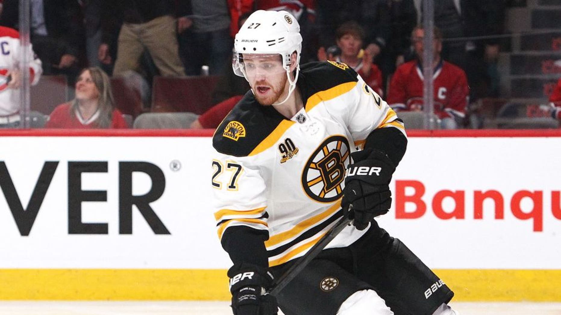MONTREAL, QC - MAY 6: Dougie Hamilton #27 of the Boston Bruins skates with the puck against the Montreal Canadiens in Game Three of the Second Round of the 2014 NHL Stanley Cup Playoffs at the Bell Centre on May 6, 2014 in Montreal, Quebec, Canada. (Photo by Francois Laplante/Freestyle Photography/Getty Images)