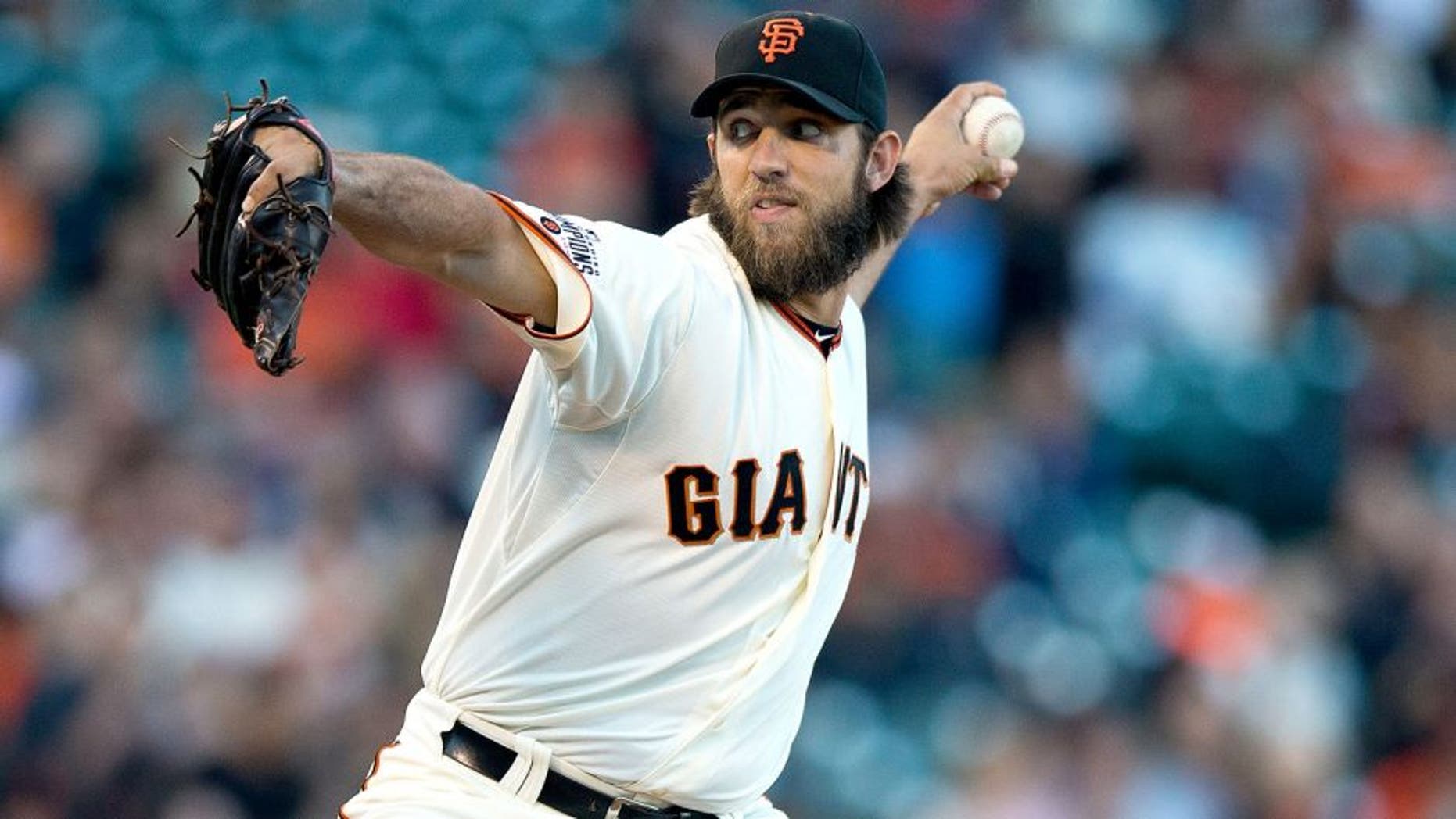 SAN FRANCISCO, CA - AUGUST 11: Madison Bumgarner #40 of the San Francisco Giants pitches against the Houston Astros during the first inning at AT&T Park on August 11, 2015 in San Francisco, California. (Photo by Jason O. Watson/Getty Images)