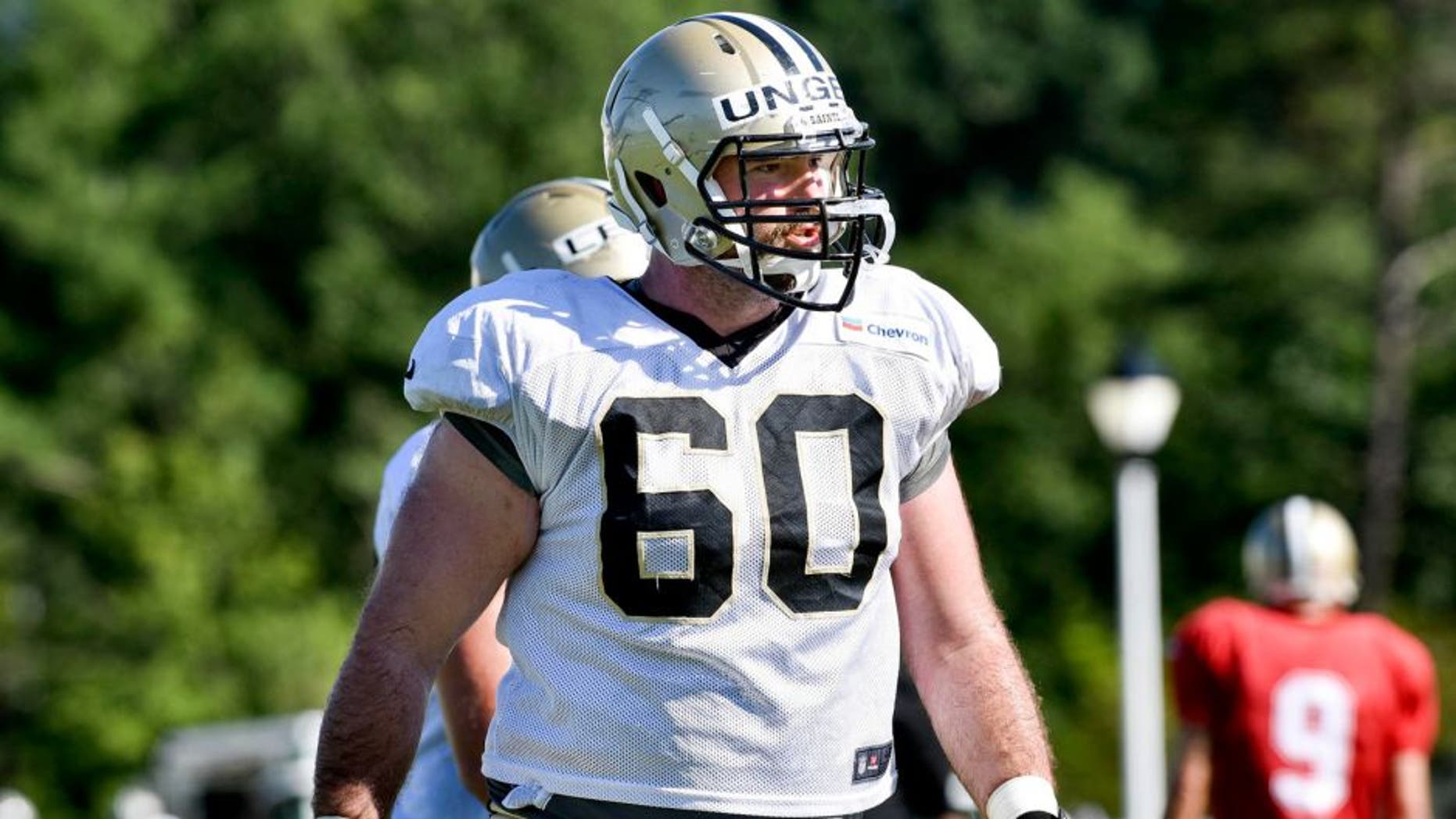 Aug 3, 2015; White Sulphur Springs, WV, USA; New Orleans Saints center Max Unger (60) stands between drills during training camp at The Greenbrier. Mandatory Credit: Michael Shroyer-USA TODAY Sports