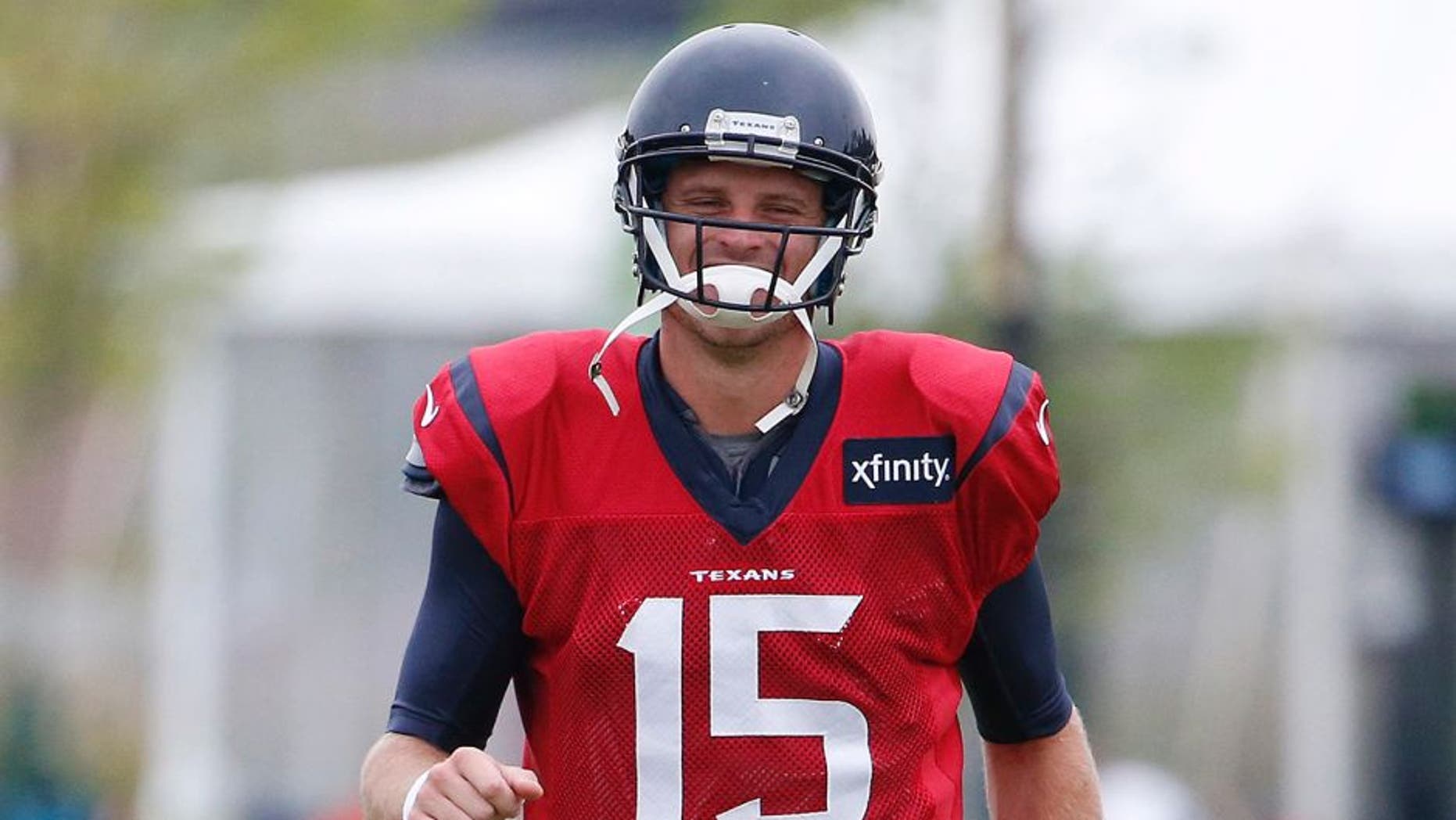 Aug 7, 2015; Richmond, VA, USA; Houston Texans quarterback Ryan Mallett (15) warms up during joint practice with the Washington Redskins as part of day eight of training camp at Bon Secours Washington Redskins Training Center. Mandatory Credit: Amber Searls-USA TODAY Sports