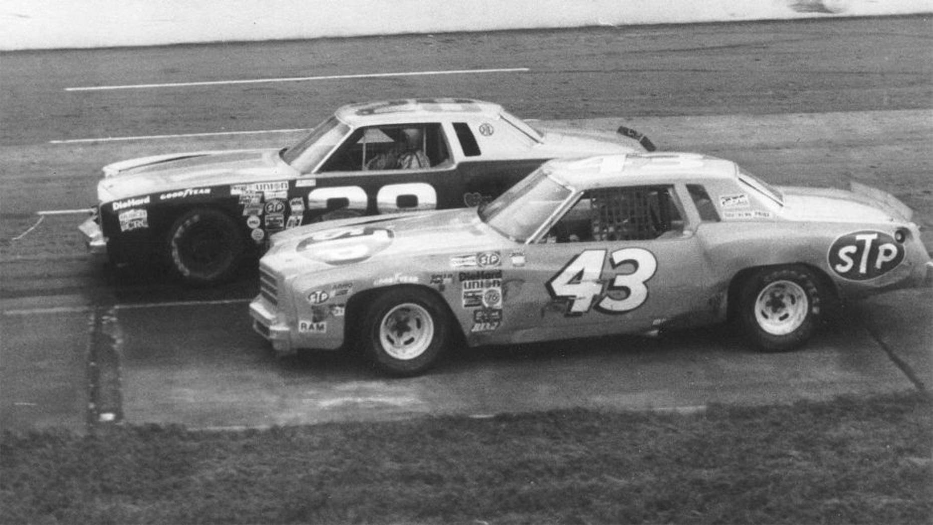 MARTINSVILLE, VA - 1979: Richard Petty (No. 43) working underneath Buddy Baker at Martinsville. (Photo by ISC Archives via Getty Images)