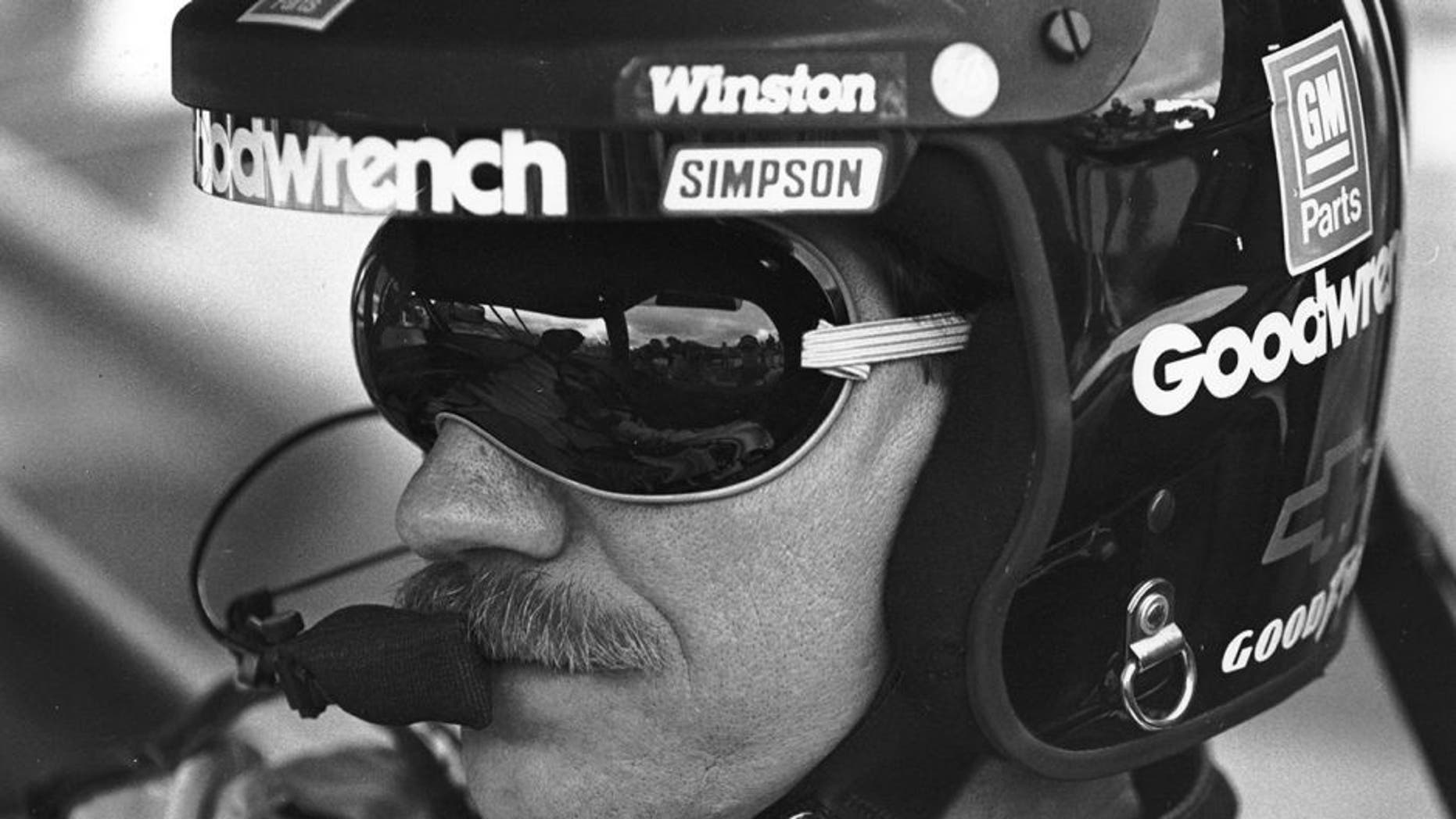 UNKNOWN: Dale Earnhardt, Sr driver of the #3 GM Goodwrench Cheverolet sits in his car before a race circa 1996. (Photo by ISC Archives via Getty Images)