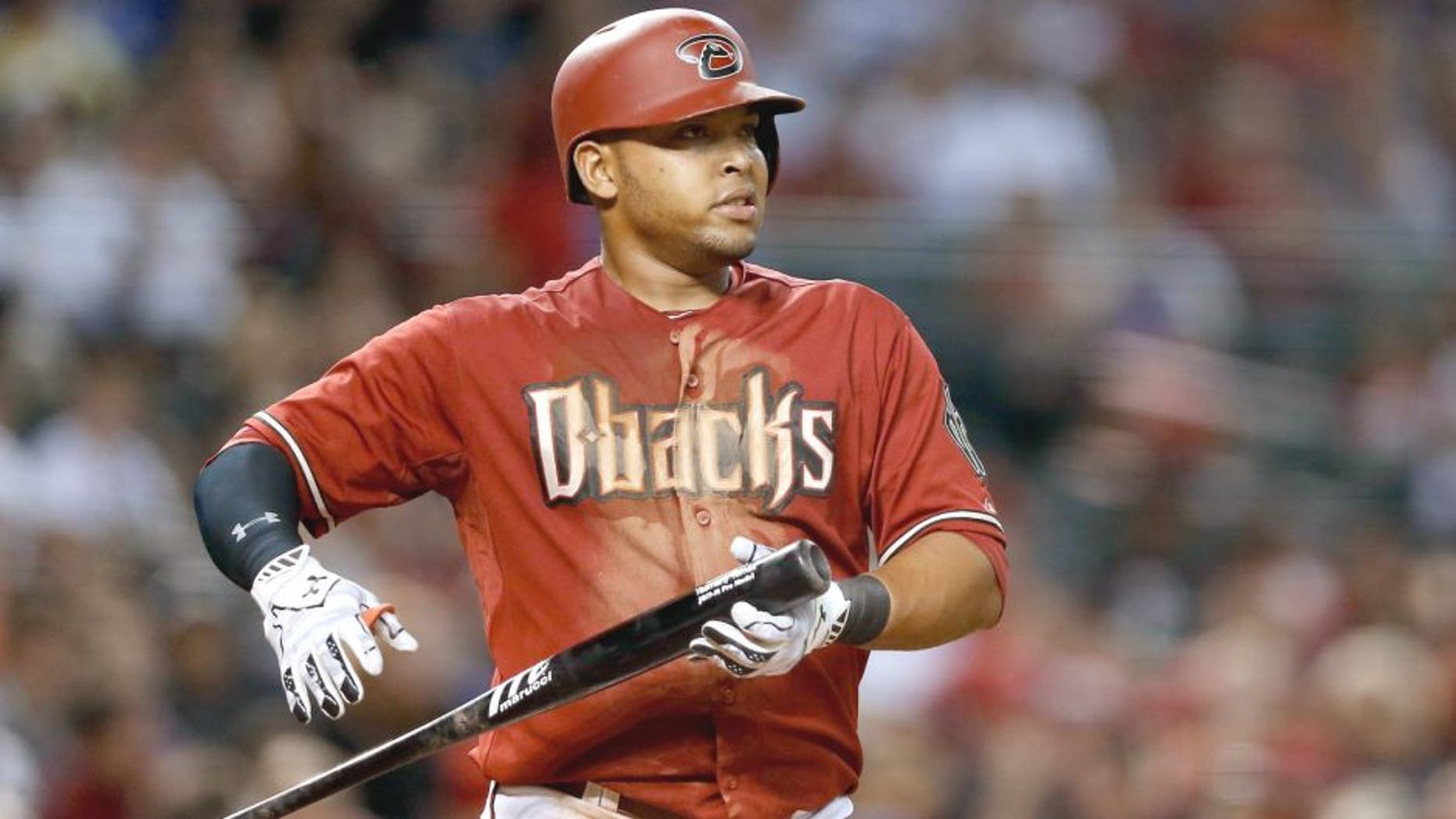 PHOENIX, AZ - JULY 01: Yasmany Tomas #24 of the Arizona Diamondbacks at bat during the MLB game against the Los Angeles Dodgers at Chase Field on July 1, 2015 in Phoenix, Arizona. (Photo by Christian Petersen/Getty Images)