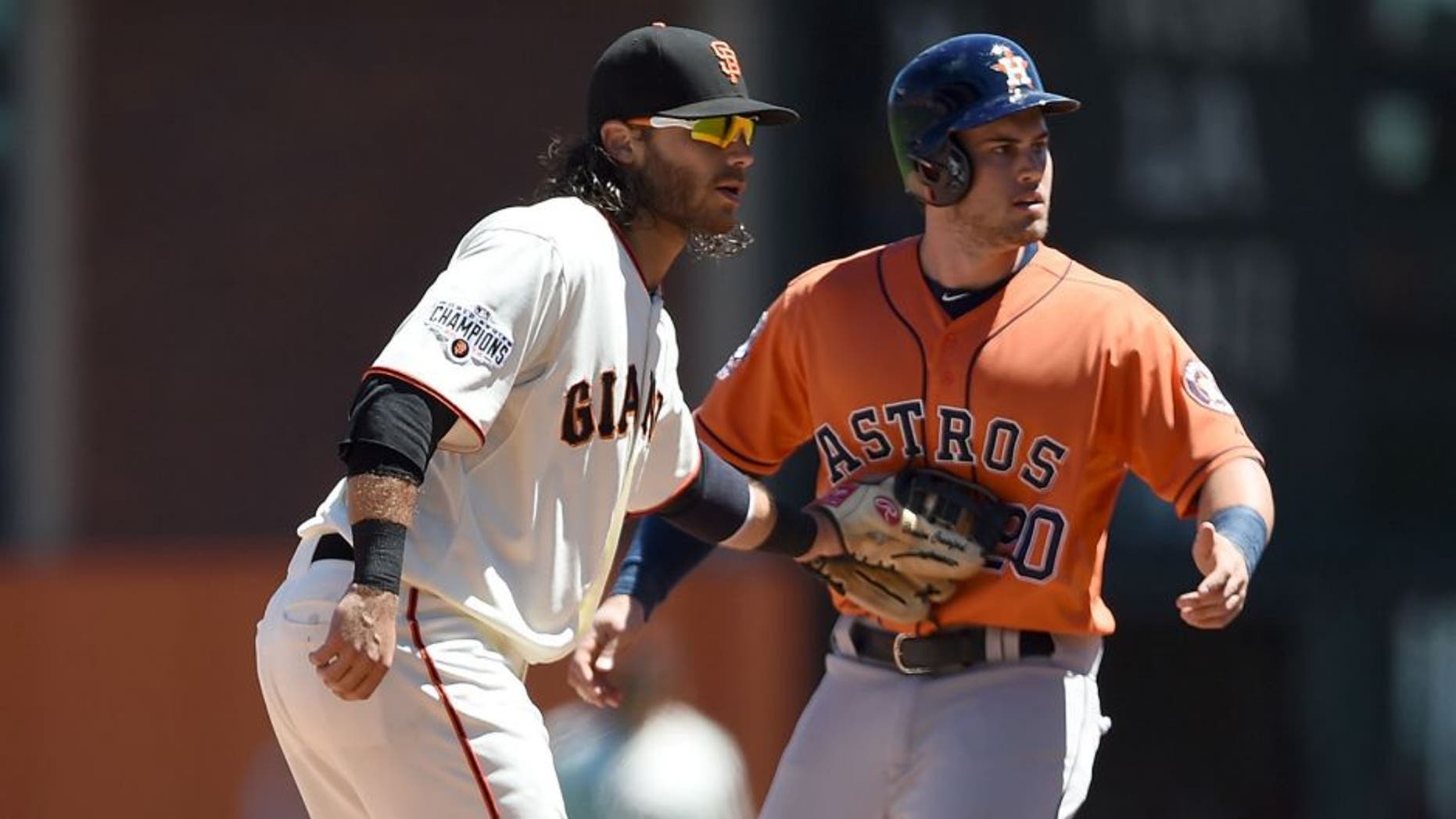SAN FRANCISCO, CA - AUGUST 12: Brandon Crawford #35 of the San Francisco Giants tags out Preston Tucker #20 of the Houston Astros attempting to steal second base in the top of the six inning at AT&T Park on August 12, 2015 in San Francisco, California. (Photo by Thearon W. Henderson/Getty Images)