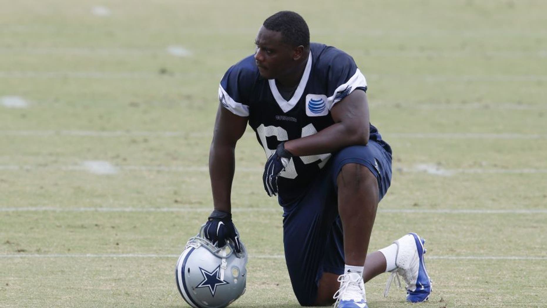 Jun 16, 2015; Irving, TX, USA; Dallas Cowboys defensive tackle Chris Whaley (64) takes a break during minicamp at Dallas Cowboys Headquarters. Mandatory Credit: Matthew Emmons-USA TODAY Sports