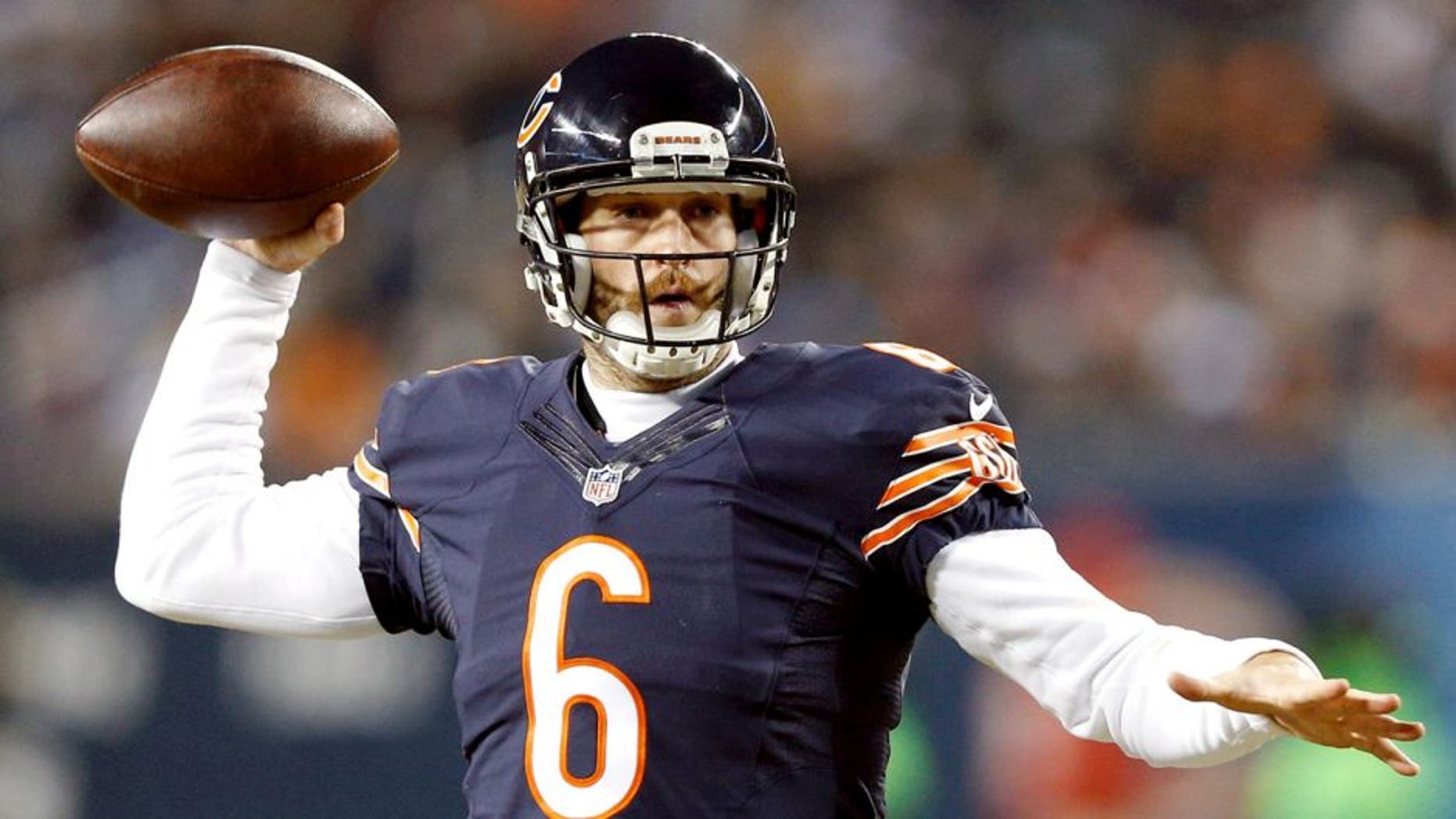 CHICAGO, IL - DECEMBER 4: Jay Cutler #6 of the Chicago Bears passes the ball against the Dallas Cowboys during the game at Soldier Field on December 4, 2014 in Chicago, Illinios. The Cowboys defeated the Bears 41-28. (Photo by Joe Robbins/Getty Images)