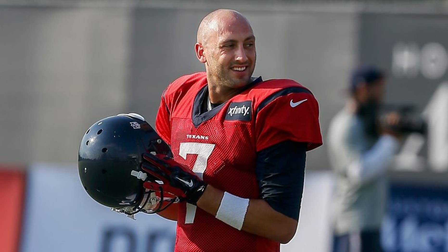 Houston Texans quarterback Brian Hoyer (7) takes the field during an NFL football training camp at the Methodist Training Center on Monday, Aug. 3, 2015 in Houston. (AP Photo/Bob Levey)