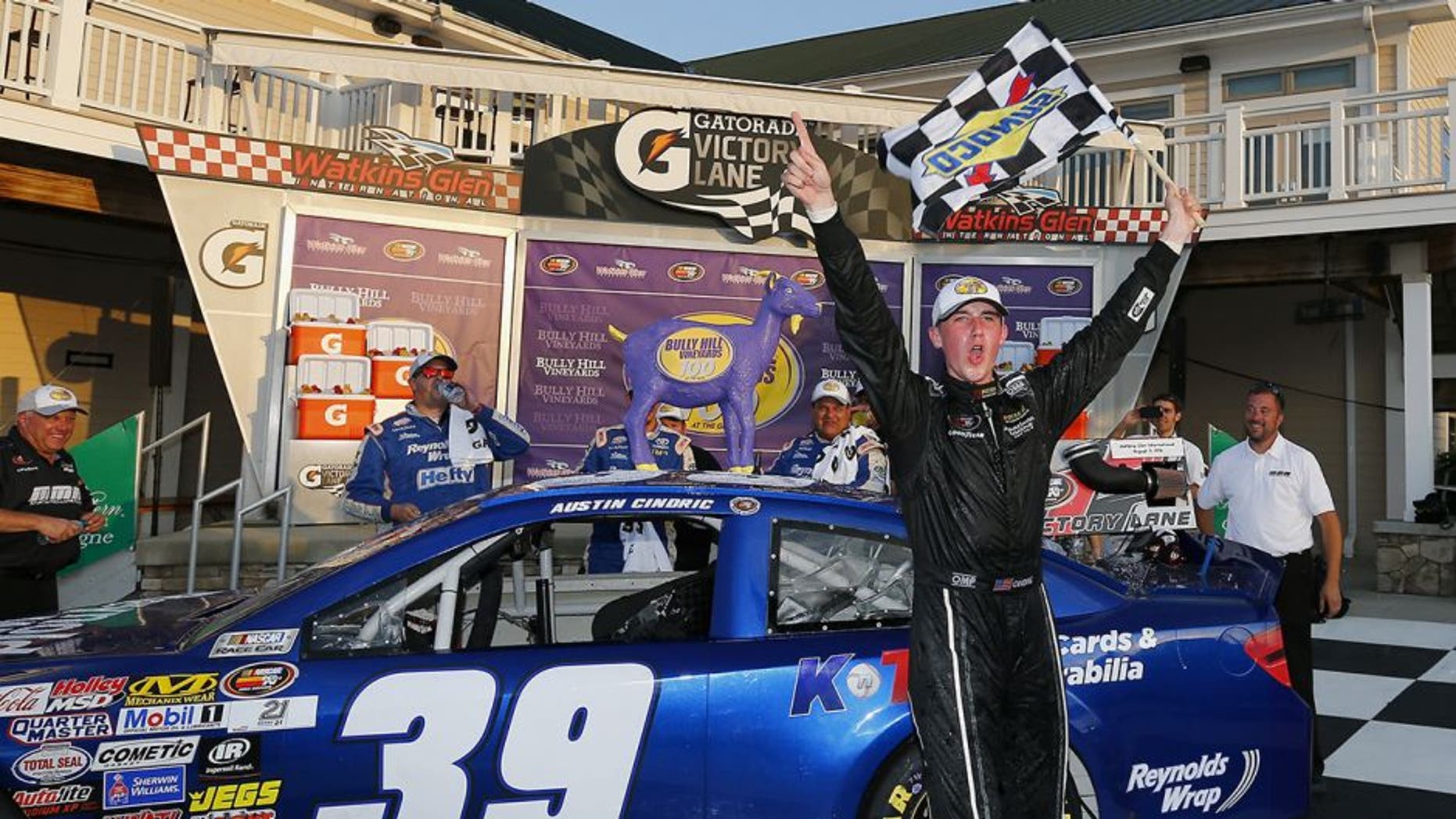 WATKINS GLEN, NY - AUGUST 05: Austin Cindric, driver of the #39 Reynolds Wrap Toyota, celebrates in victory lane after winning the NASCAR K&N Pro East Series Bully Hill Vineyards 100 at Watkins Glen International on August 5, 2016 in Watkins Glen, New York. (Photo by Jonathan Ferrey/NASCAR via Getty Images)