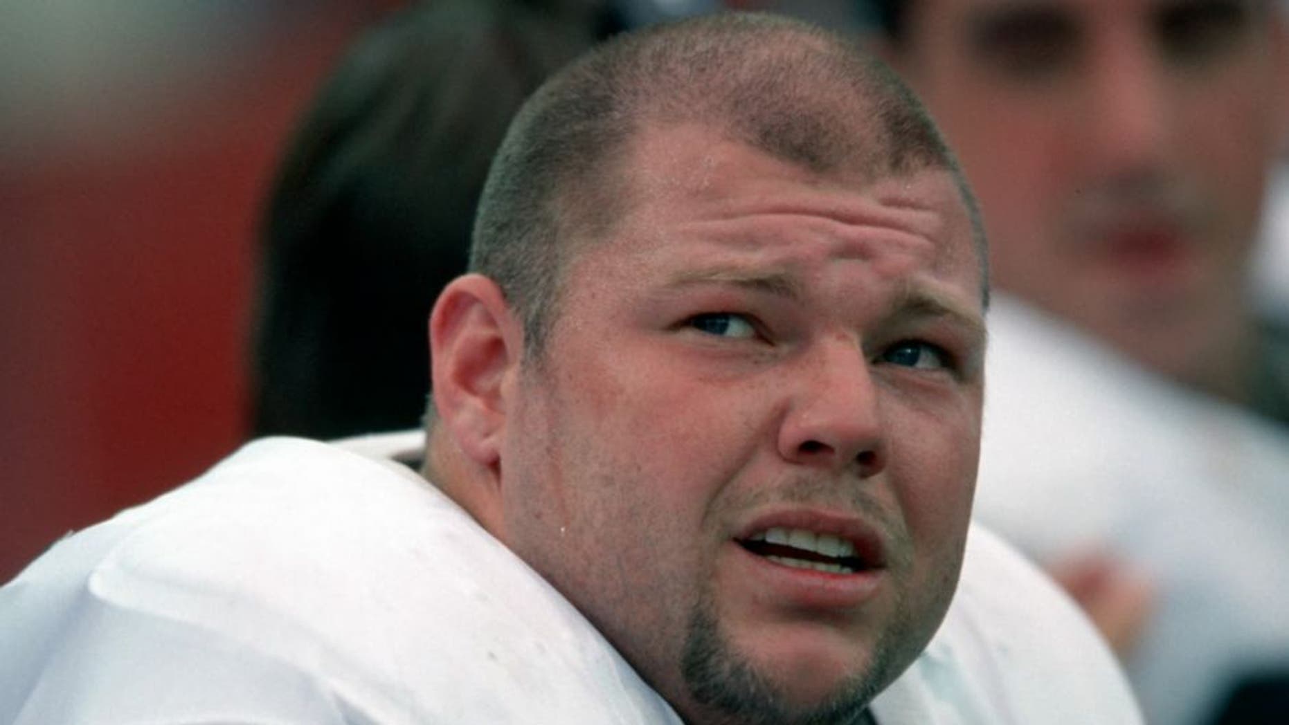 ORCHARD PARK, NY - OCTOBER 17: Offensive lineman Barret Robbins #63 of the Oakland Raiders on the bench during a game against the Buffalo Bills at Rich Stadium on October 17, 1999 in Orchard Park, New York. (Photo by George Gojkovich/Getty Images)