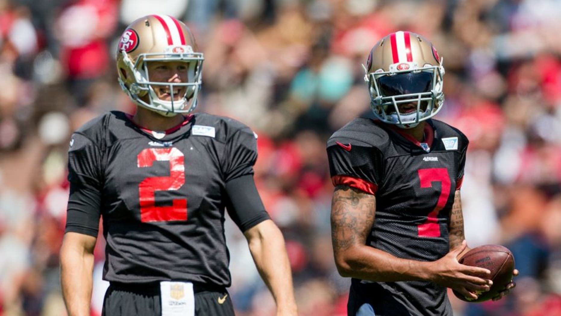 Aug 10, 2016; San Francisco, CA, USA; San Francisco 49ers quarterback Blaine Gabbert (2) and quarterback Colin Kaepernick (7) train at Kezar Stadium. Mandatory Credit: John Hefti-USA TODAY Sports