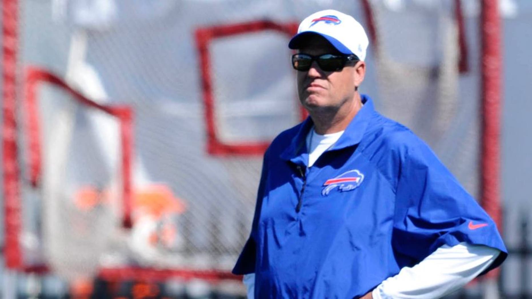 Jul 31, 2015; Pittsford, NY, USA; Buffalo Bills head coach Rex Ryan watches proceedings during training camp at St. John Fisher College. Mandatory Credit: Mark Konezny-USA TODAY Sports