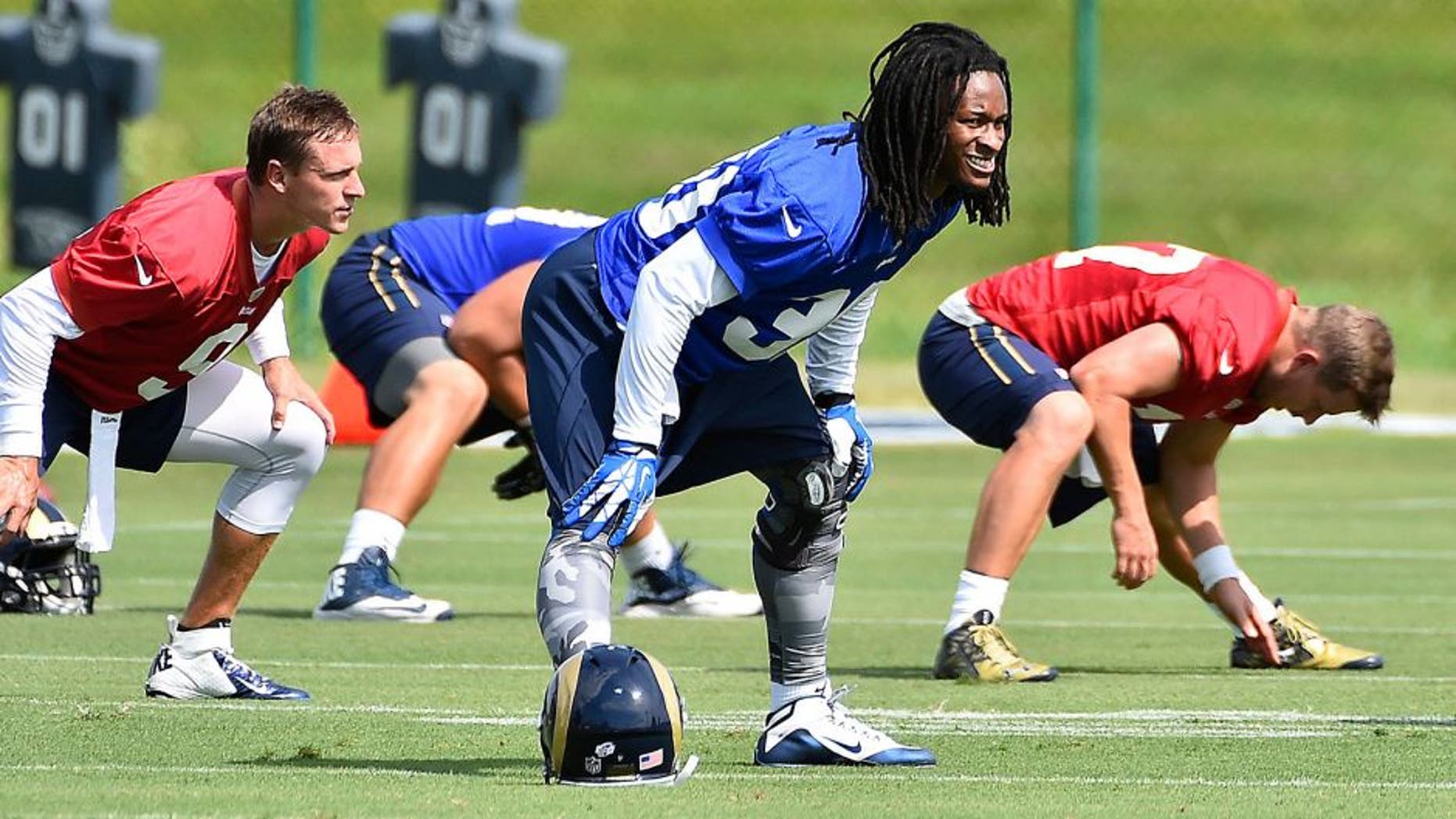 Aug 1, 2015; Earth City, MO, USA; St. Louis Rams running back Todd Gurley (30) stretches at Rams Park. Mandatory Credit: Jasen Vinlove-USA TODAY Sports