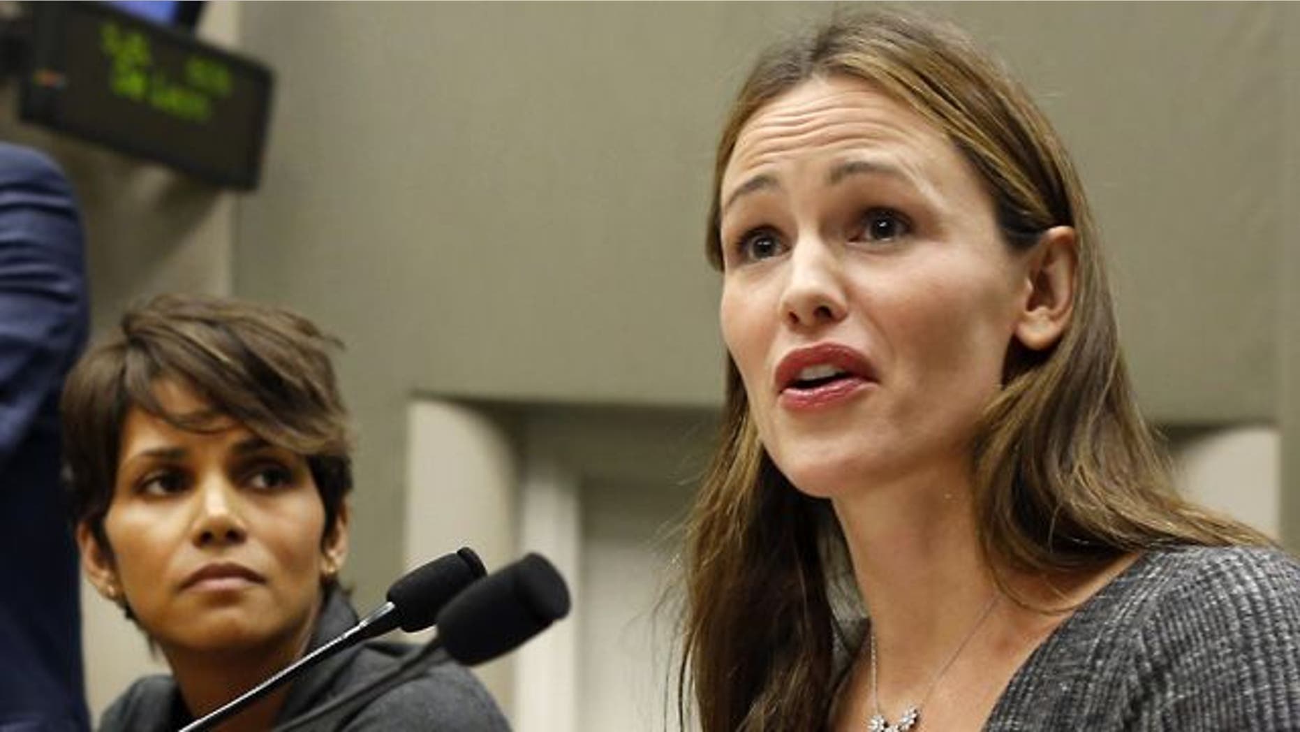 Actresses Halle Berry (left) and Jennifer Garner testify in support of a bill increasing penalties for paparazzi who harass the children of public figures earlier this year in Sacramento, Calif. (AP Photo)