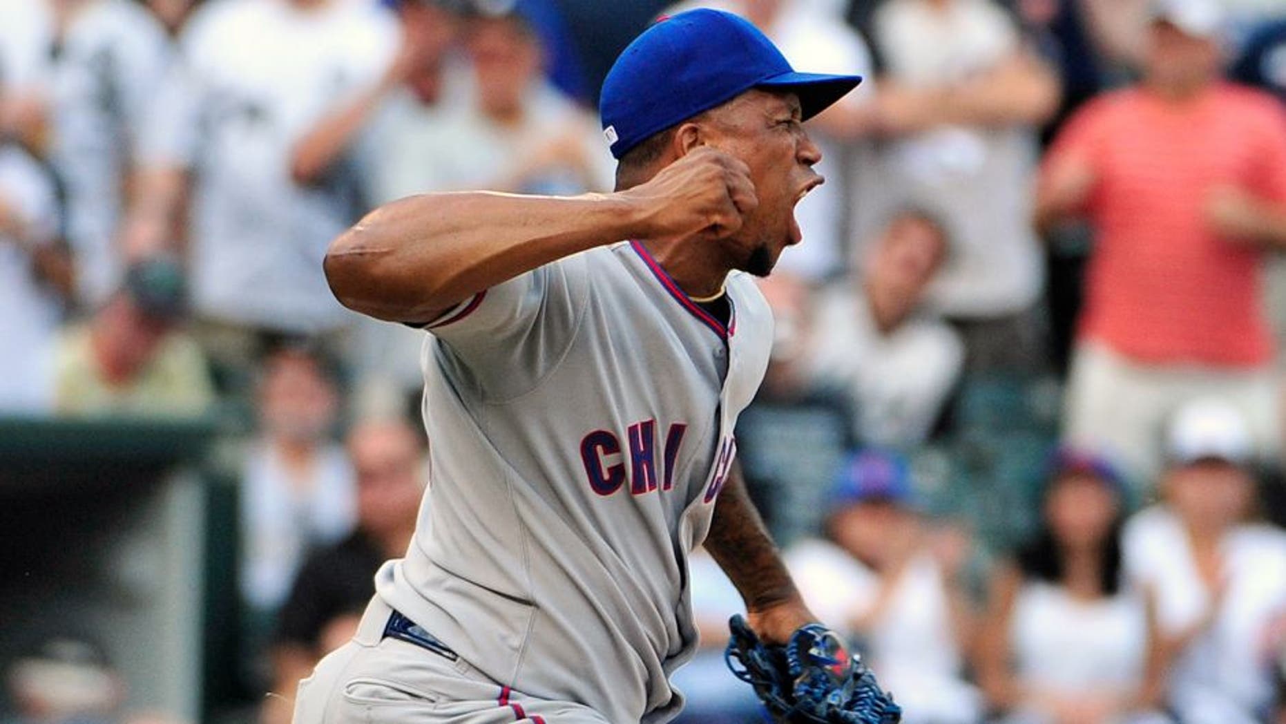 Aug 14, 2015; Chicago, IL, USA; Chicago Cubs relief pitcher Pedro Strop (46) reacts after striking out Chicago White Sox third baseman Tyler Saladino (not pictured) during the eighth inning at U.S Cellular Field. The Chicago Cubs defeated the Chicago White Sox 6-5. Mandatory Credit: David Banks-USA TODAY Sports