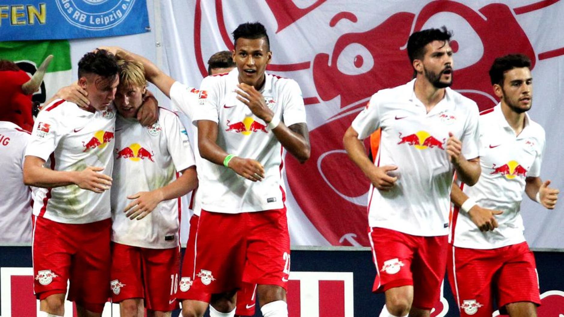 LEIPZIG, GERMANY - AUGUST 03: Emil Forsberg of Leipzig celebrates the fourth goal with teammates during the Second Bundesliga match between RB Leipzig and SpVgg Greuther Fuerth at Red Bull Arena on August 3, 2015 in Leipzig, Germany. (Photo by Karina Hessland/Bongarts/Getty Images)