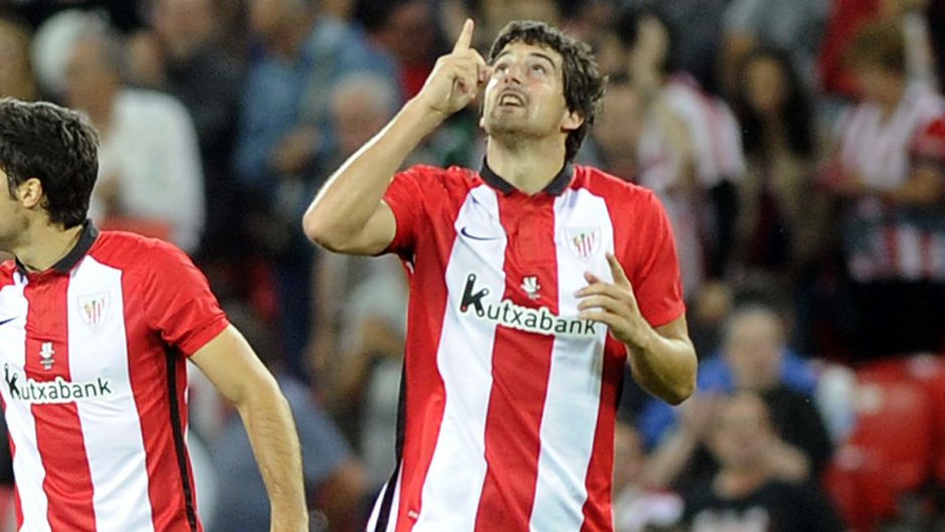 Athletic Bilbao's defender Mikel San Jose celebrates after scoring during the Spanish Supercup first-leg football match Athletic Club Bilbao vs FC Barcelona at the San Mames stadium in Bilbao on August 14, 2015. AFP PHOTO/ ANDER GILLENEA (Photo credit should read ANDER GILLENEA/AFP/Getty Images)